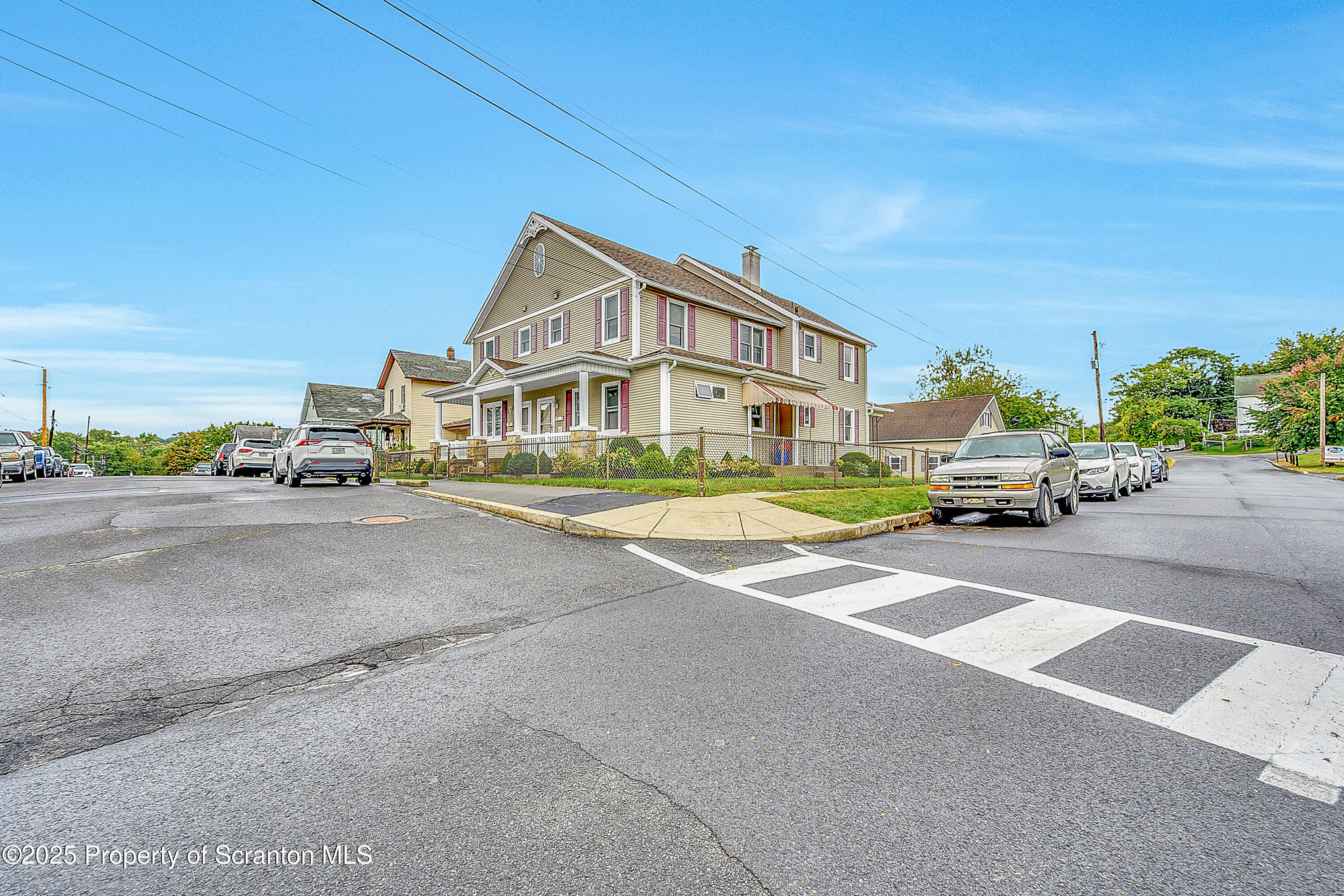 441 14th Avenue Scranton, PA 18504 - Photo 2 of 25 a car parked on the side of the road