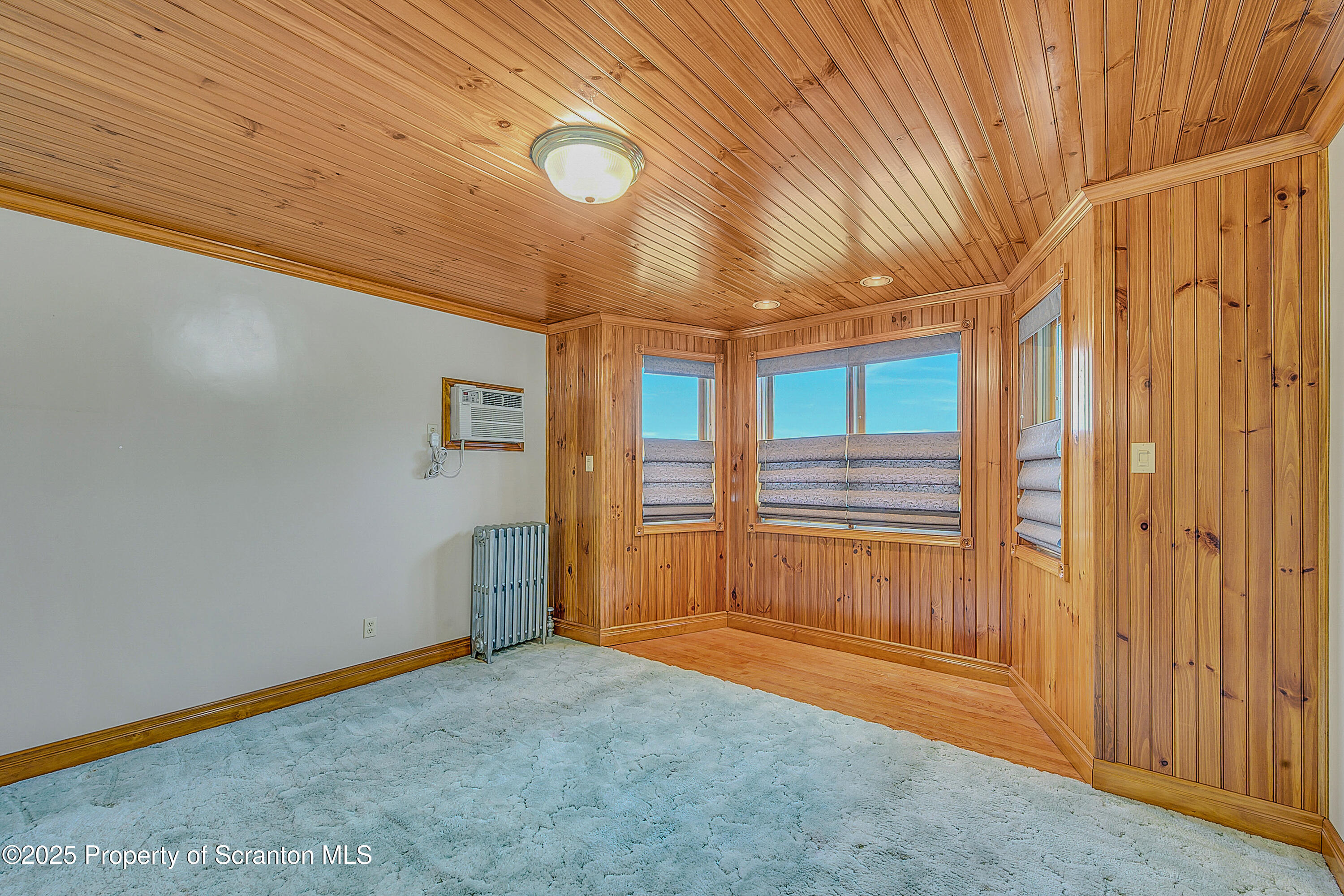 441 14th Avenue Scranton, PA 18504 - Photo 21 of 25 a view of an empty room with a window