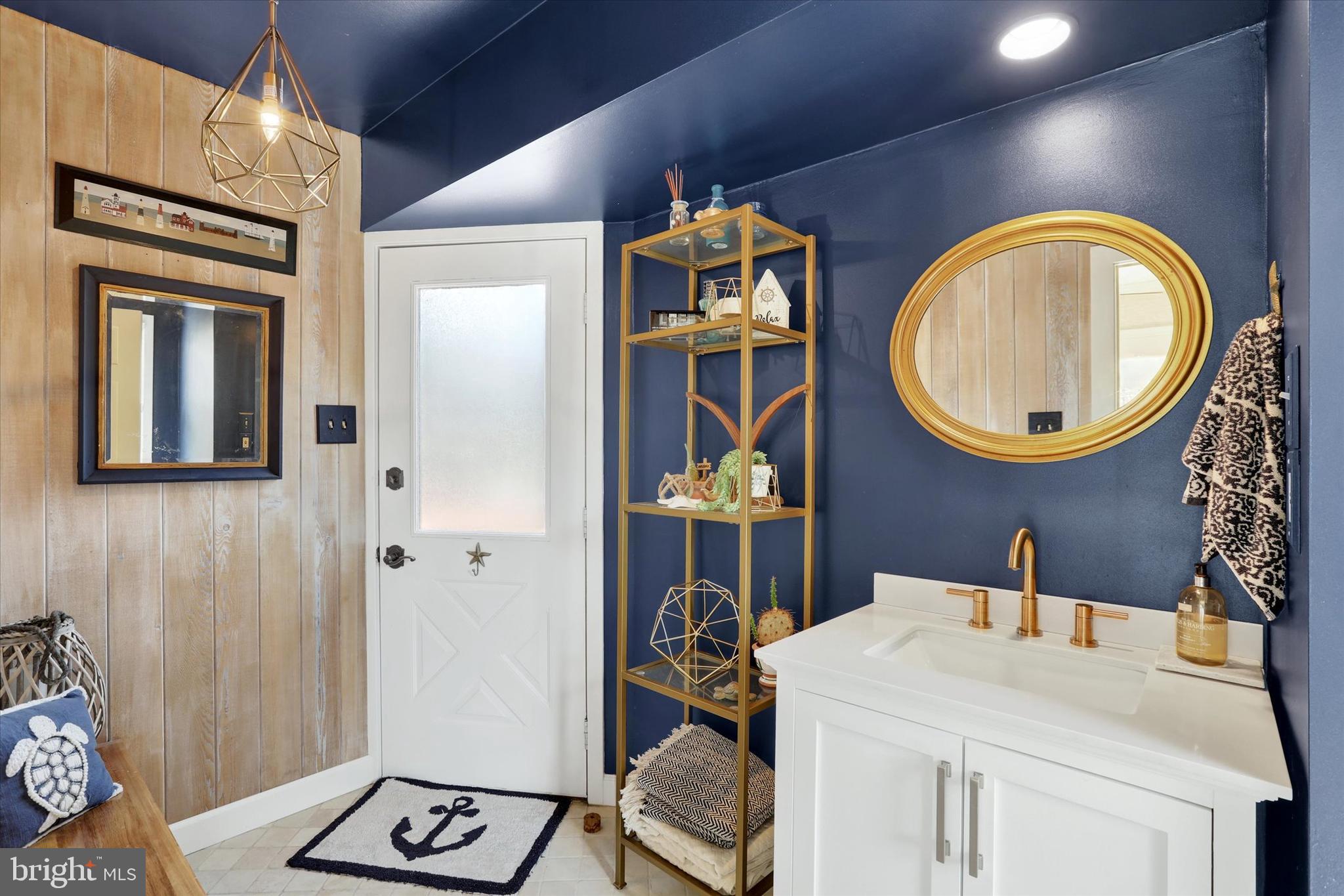 414 Trend Road Yardley, PA 19067 - Photo 19 of 57 a bathroom with a sink and a mirror