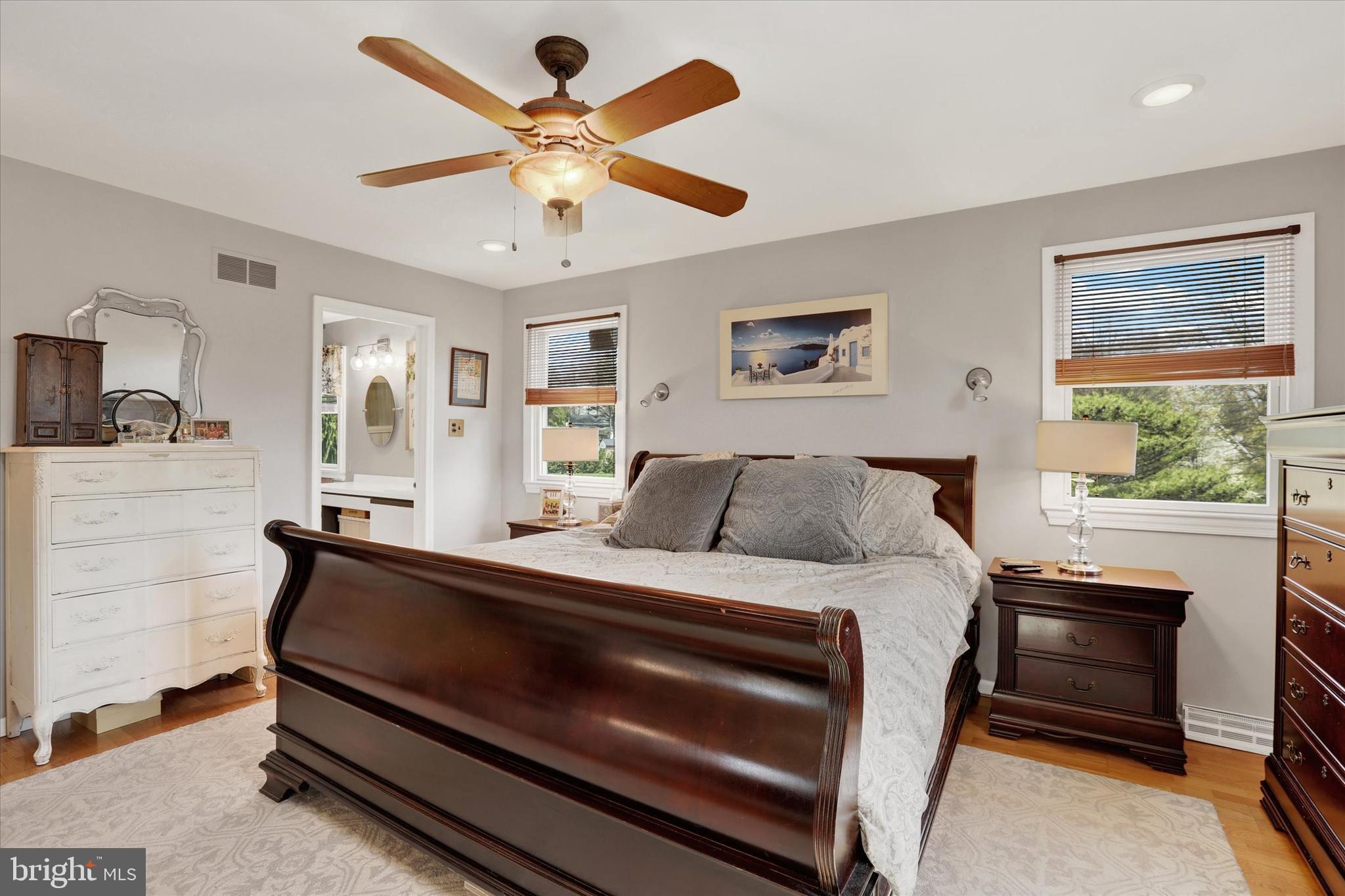 414 Trend Road Yardley, PA 19067 - Photo 21 of 57 a bedroom with a bed and a chandelier