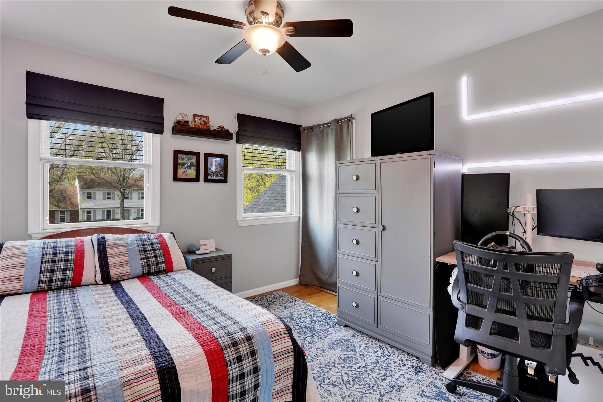 414 Trend Road Yardley, PA 19067 - Photo 26 of 57 a bedroom with a bed and a flat screen tv