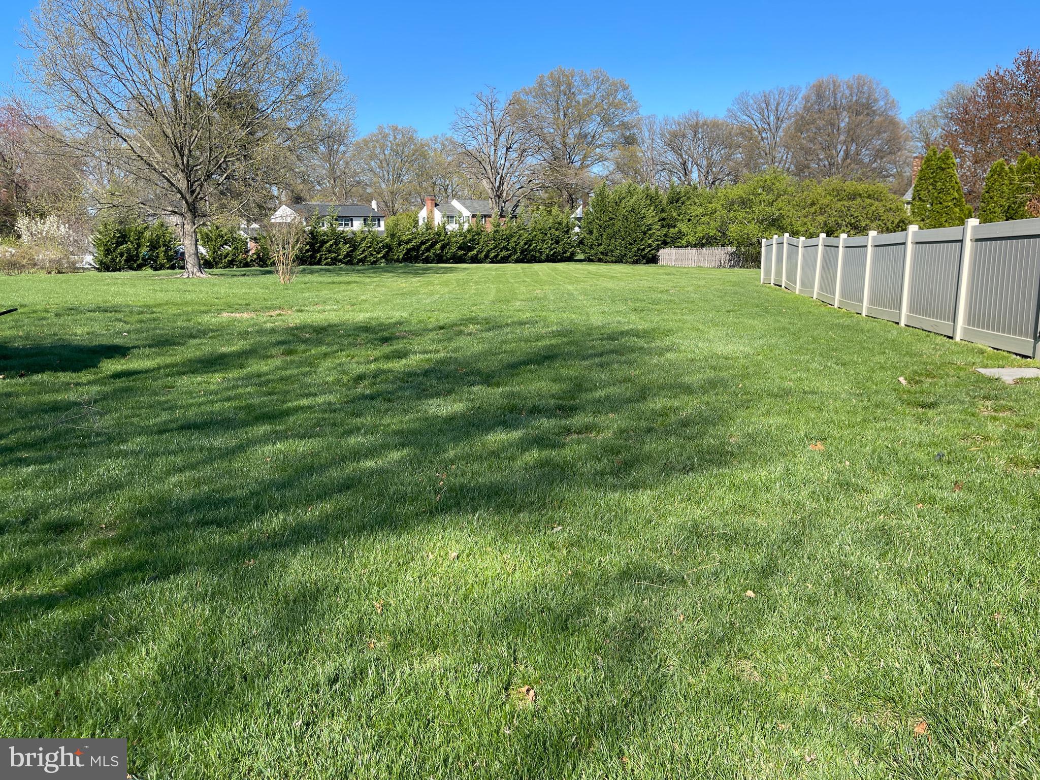 414 Trend Road Yardley, PA 19067 - Photo 42 of 57 a view of a grassy field with trees in the background