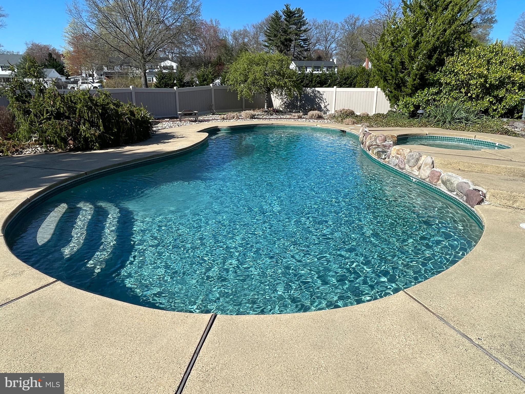 414 Trend Road Yardley, PA 19067 - Photo 44 of 57 a view of a swimming pool with a yard