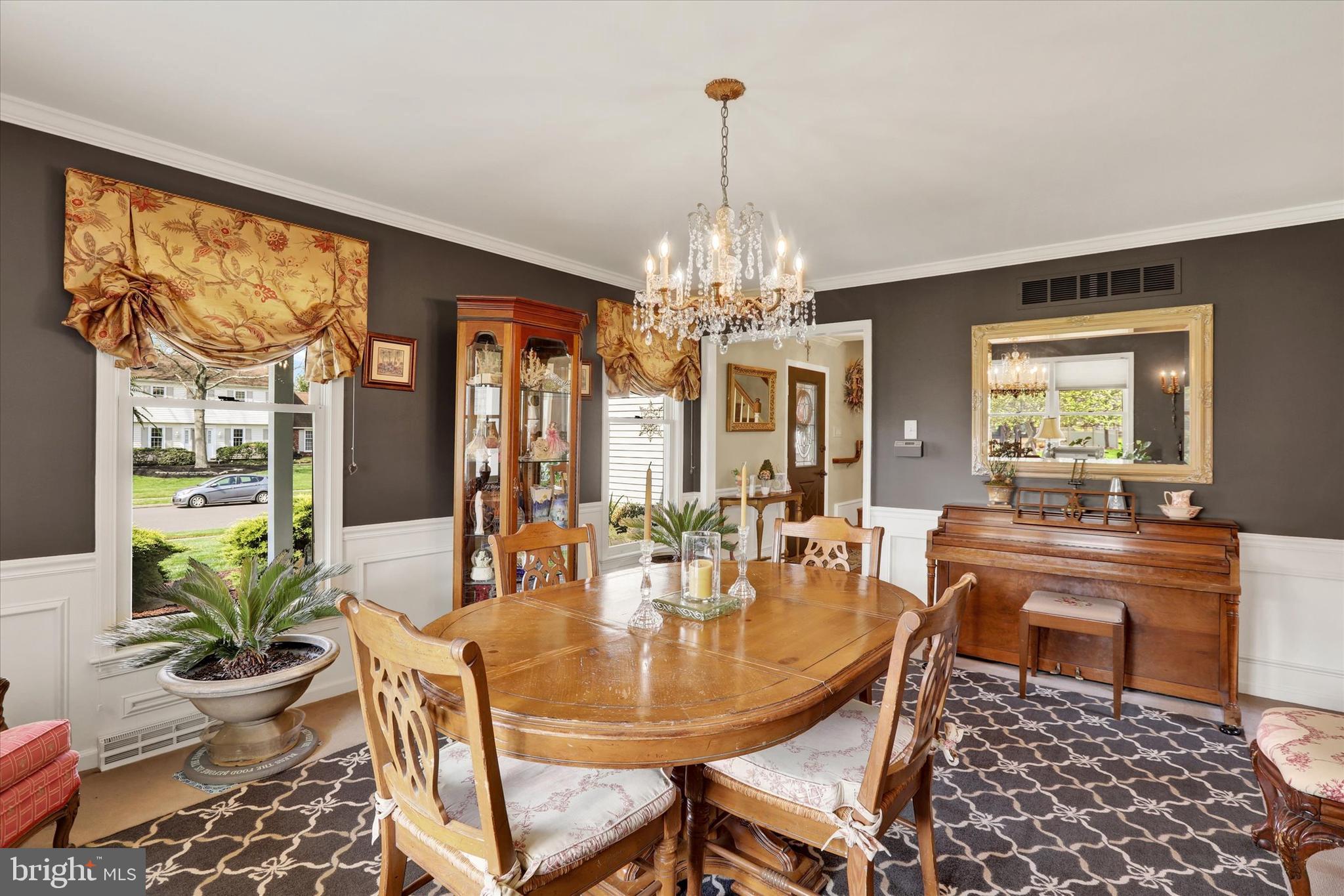414 Trend Road Yardley, PA 19067 - Photo 5 of 57 a dining room with furniture a chandelier and window