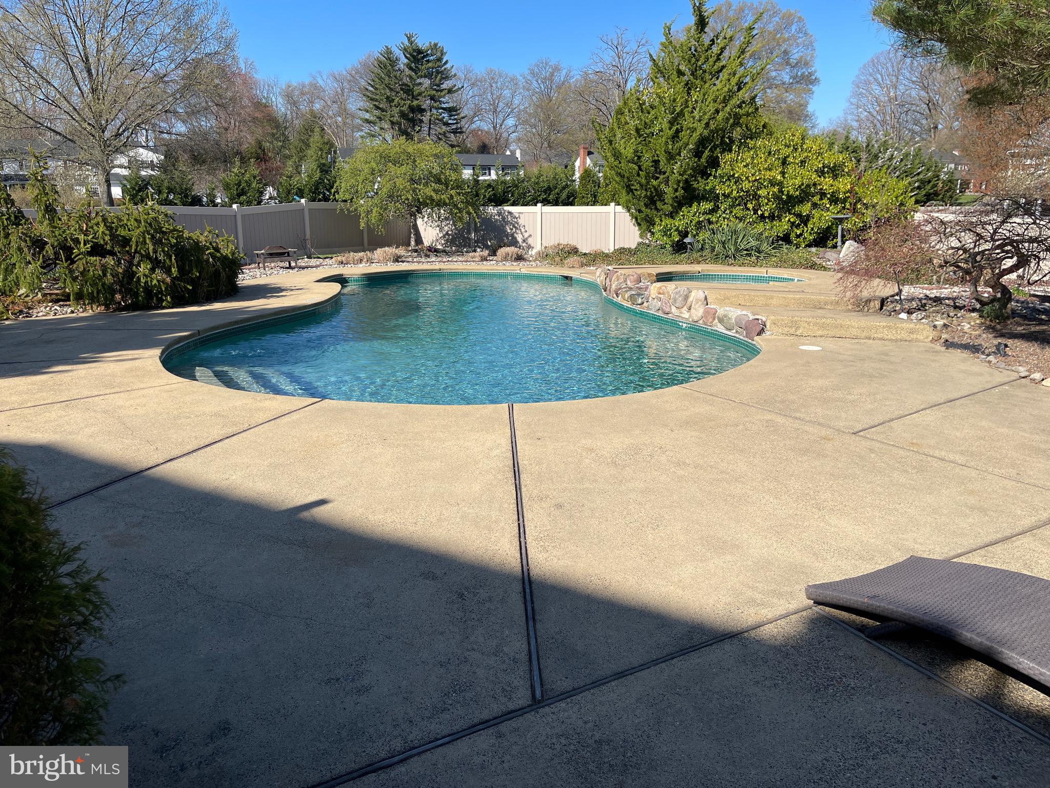 414 Trend Road Yardley, PA 19067 - Photo 51 of 57 a view of a swimming pool with a yard
