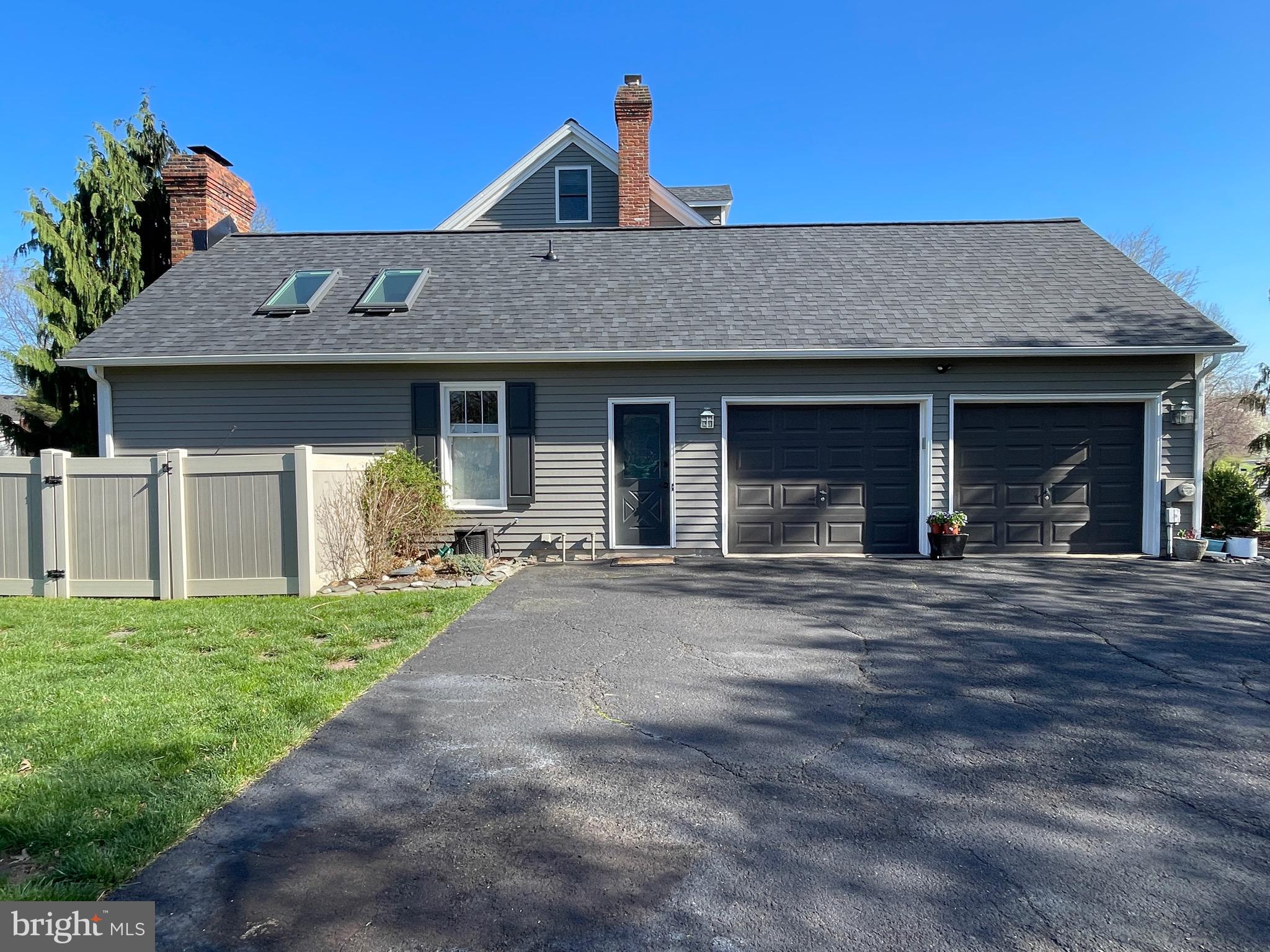 414 Trend Road Yardley, PA 19067 - Photo 54 of 57 a front view of a house with a yard
