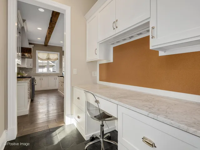 a view of a kitchen cabinets and a counter place