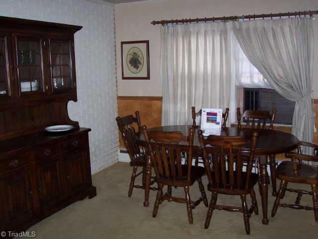 3206 Lardner Road Greensboro, NC 27405 - Photo 4 of 7 Other. Spacious dining room adjoins kitchen for convenience in serving.