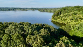 63 Charlsie Lane Waverly, TN 37185 - Photo 3 of 12 a view of a lake with a city view