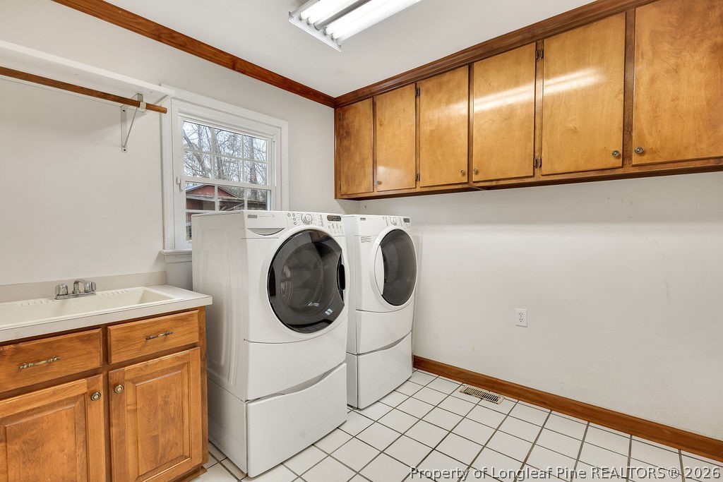 698 Sheriff Watson Road Sanford, NC 27332 - Photo 12 of 41 a utility room with dryer and washer
