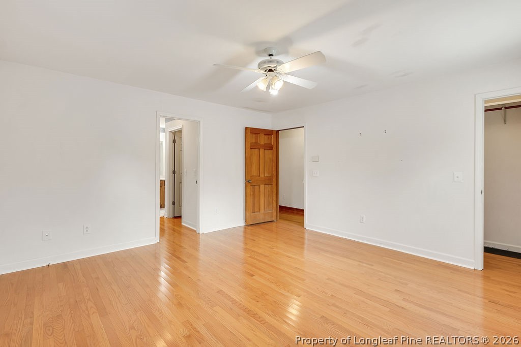 698 Sheriff Watson Road Sanford, NC 27332 - Photo 28 of 41 a view of an empty room with wooden floor