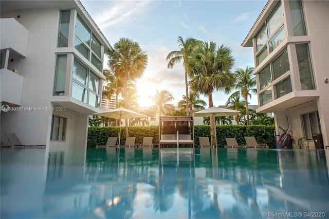 a view of pool with outdoor seating