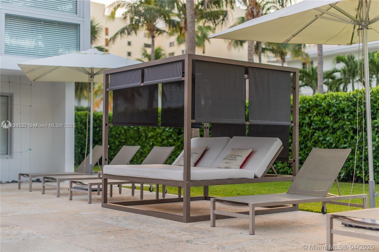 285 Sunrise Drive, Unit 108 Key Biscayne, FL 33149 - Photo 6 of 9 a view of outdoor space yard and patio