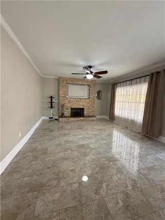 a kitchen with a refrigerator coffee maker on the counter space
