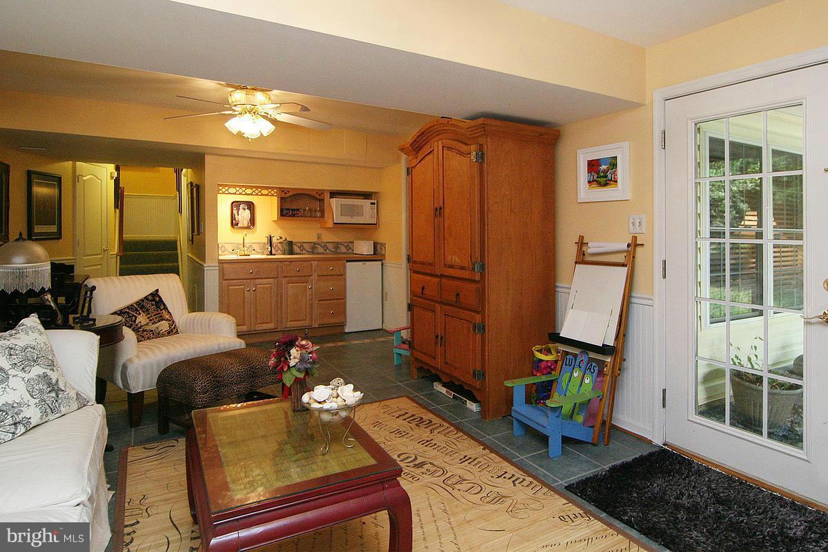 2560 Bear Den Road Frederick, MD 21701 - Photo 23 of 30 a room with furniture and a window