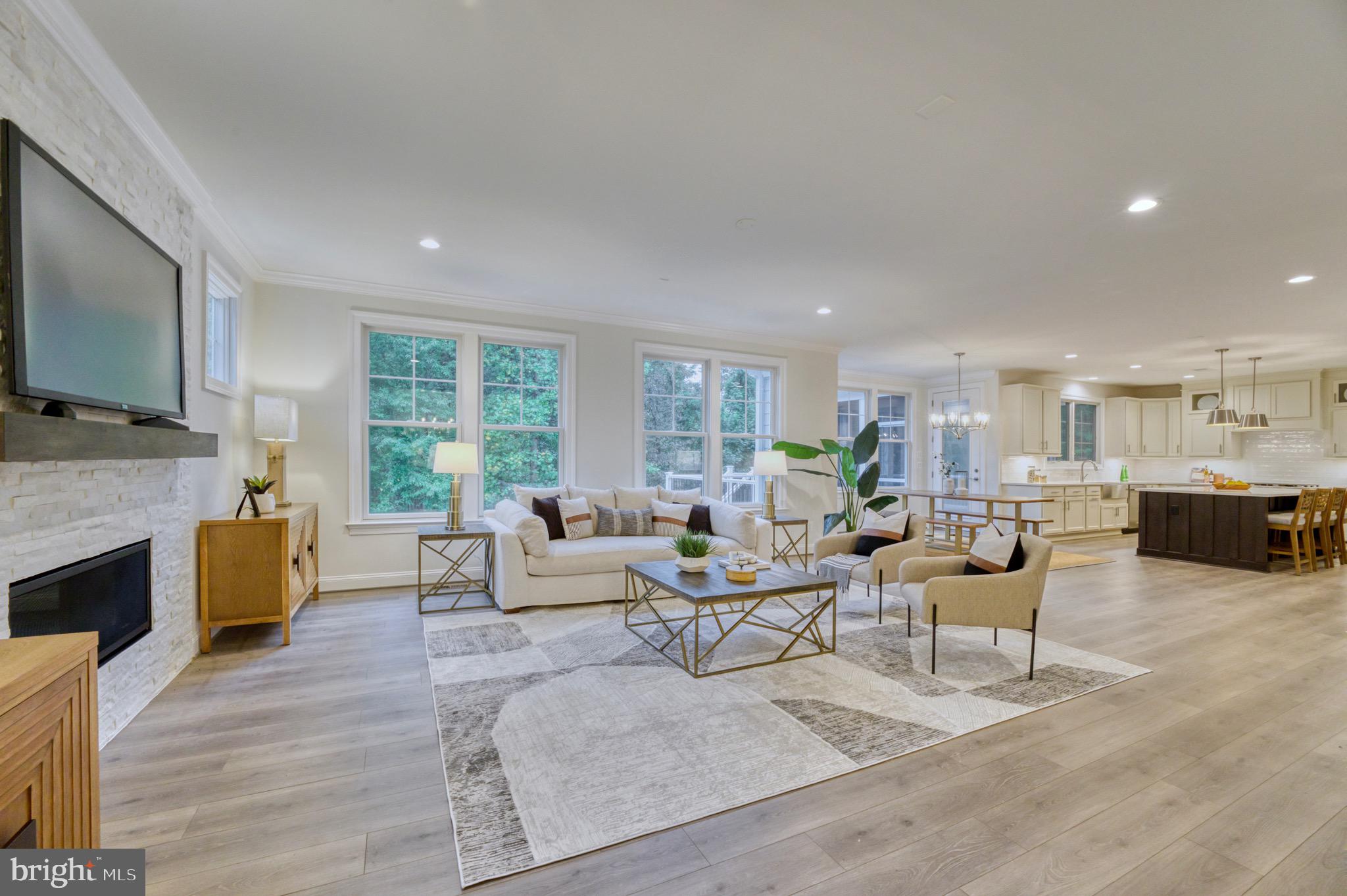 2236 Laurel Ridge Road Vienna, VA 22181 - Photo 15 of 78 a living room with fireplace furniture and a flat screen tv