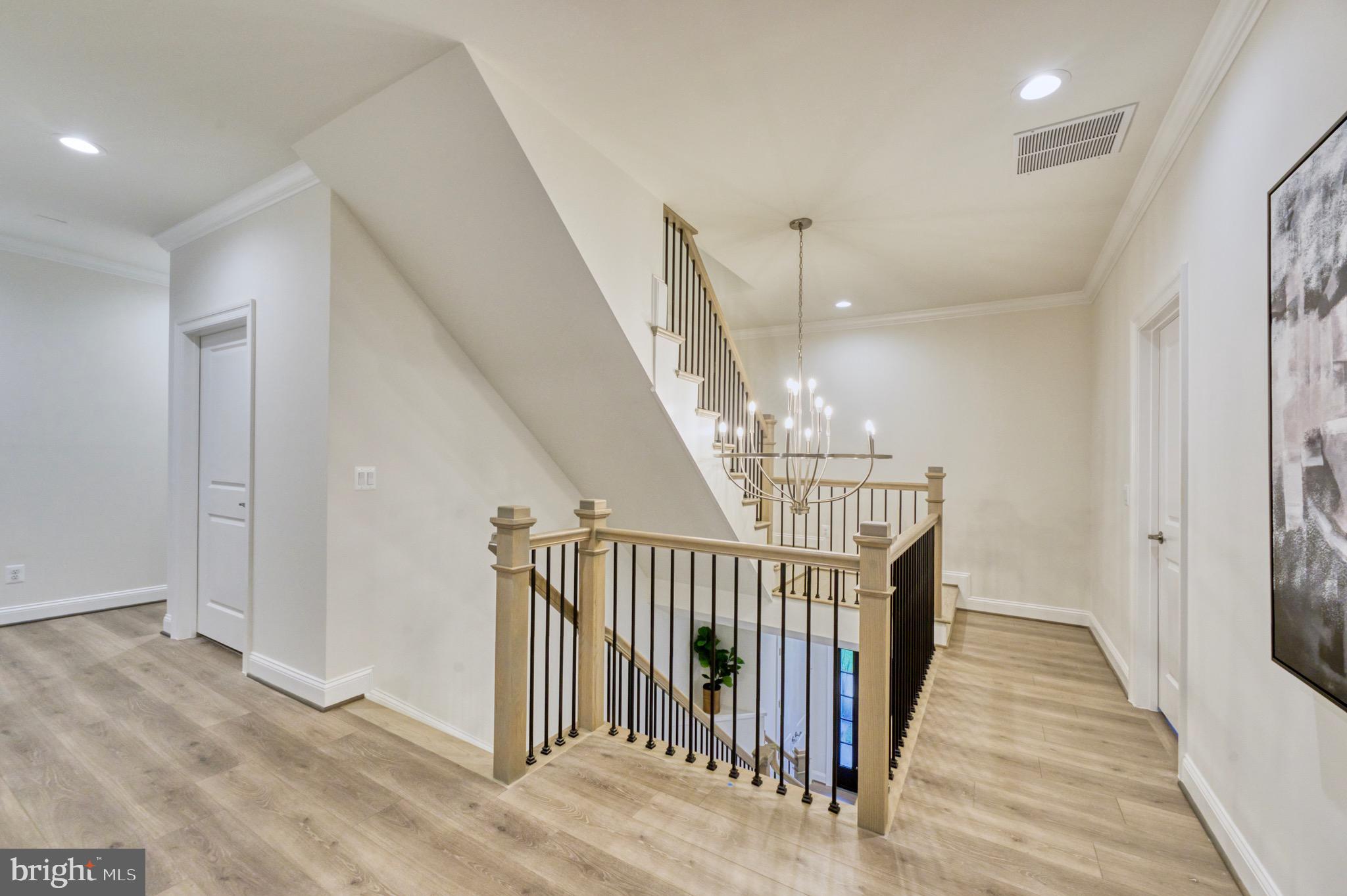 2236 Laurel Ridge Road Vienna, VA 22181 - Photo 29 of 78 a view of a hallway with entryway and stairs
