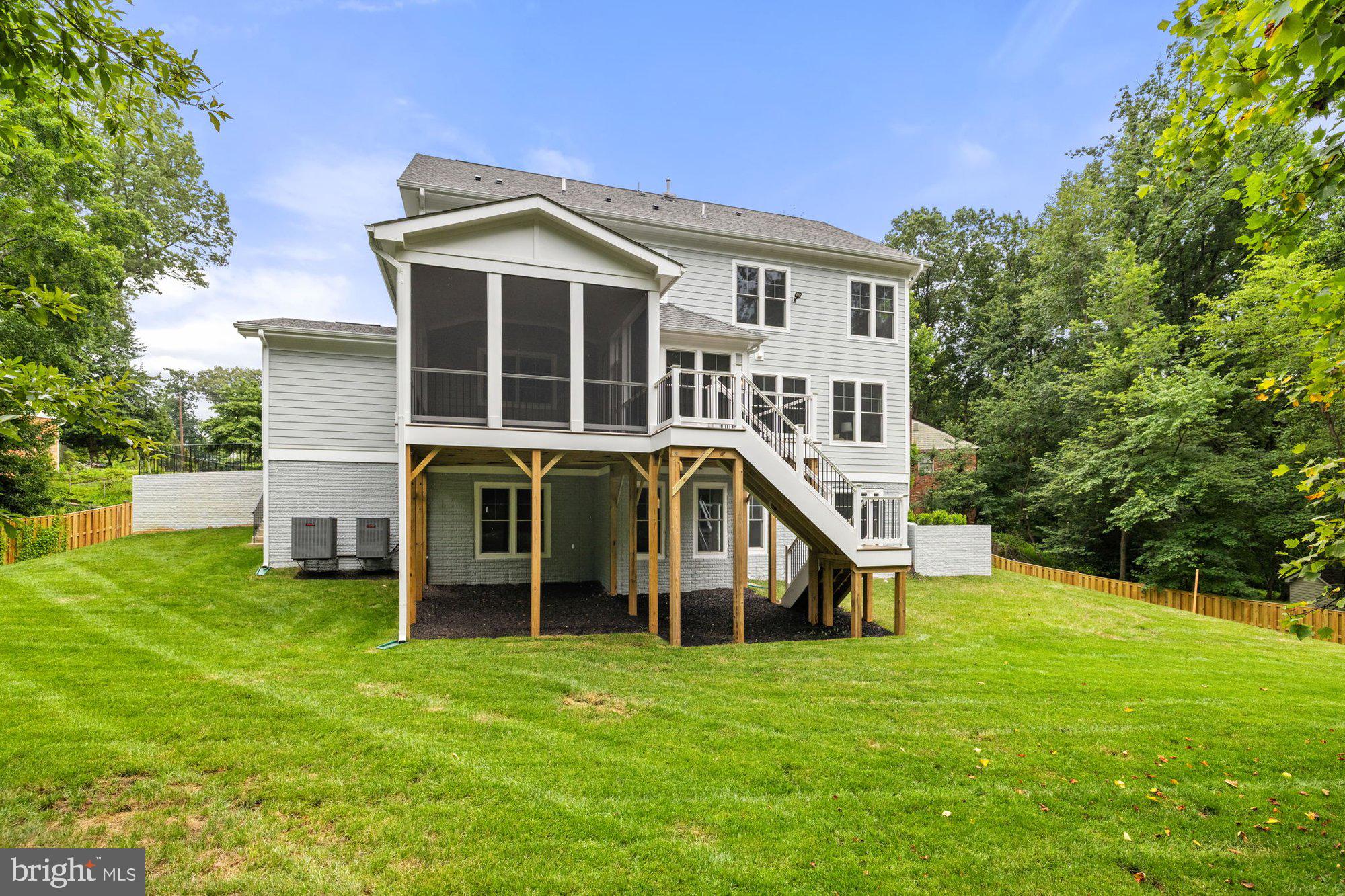 2236 Laurel Ridge Road Vienna, VA 22181 - Photo 4 of 78 a view of a house with a yard and sitting area