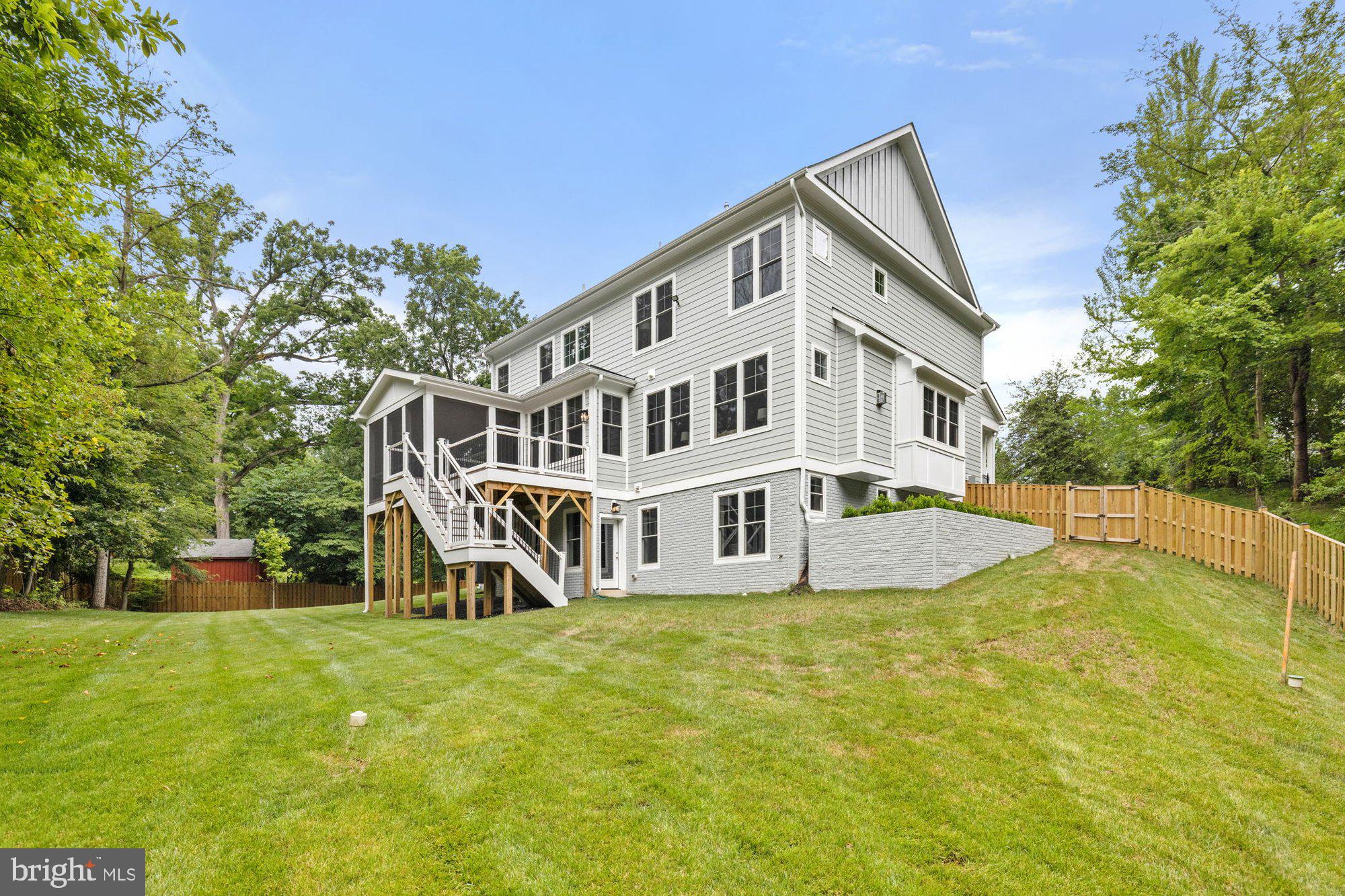 2236 Laurel Ridge Road Vienna, VA 22181 - Photo 5 of 78 a view of a house with a yard and sitting area