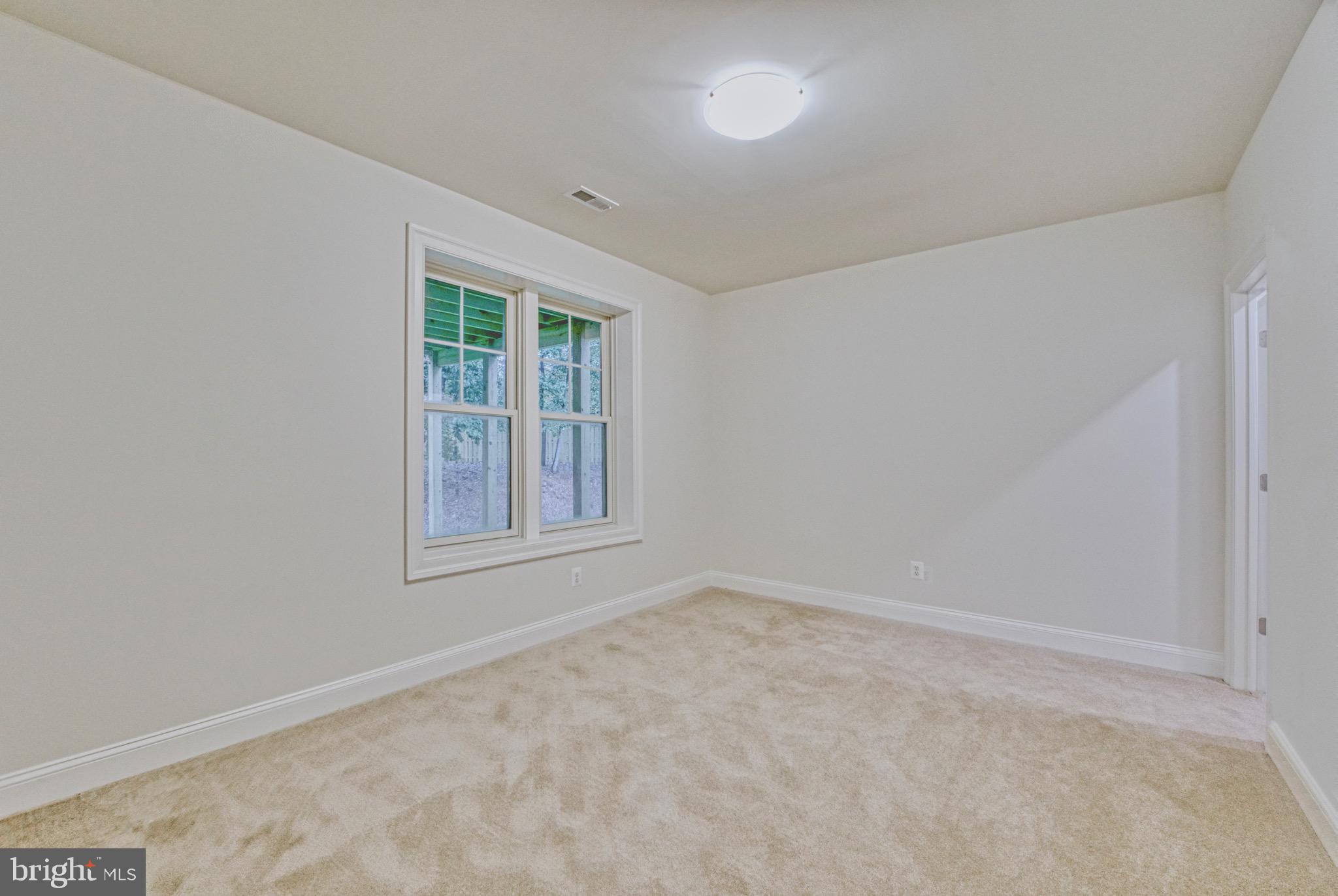 2236 Laurel Ridge Road Vienna, VA 22181 - Photo 52 of 78 an empty room with a window