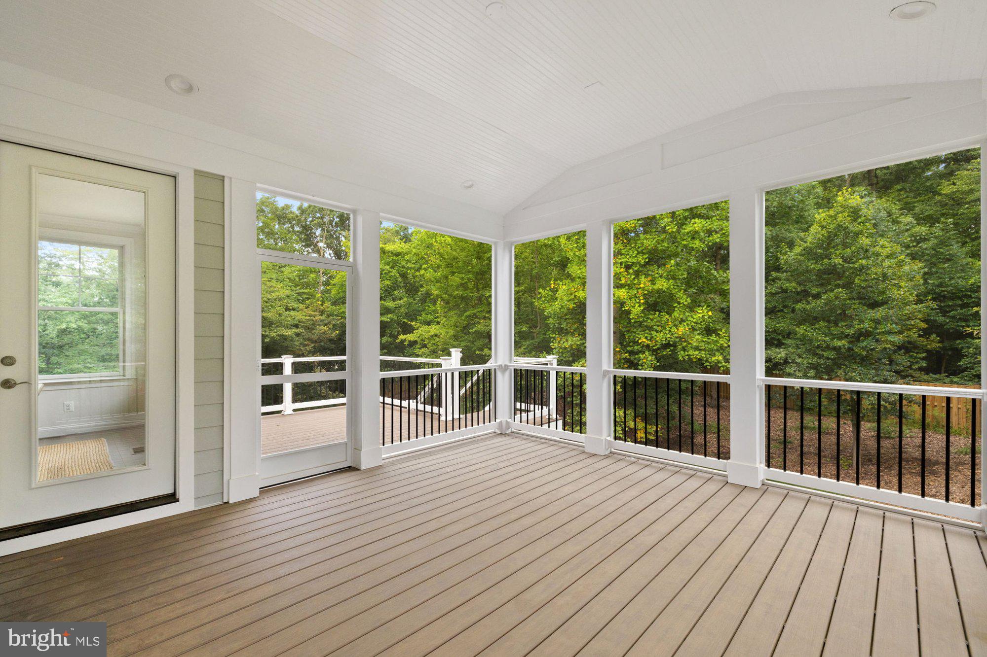 2236 Laurel Ridge Road Vienna, VA 22181 - Photo 53 of 78 a view of a room with wooden floor and windows
