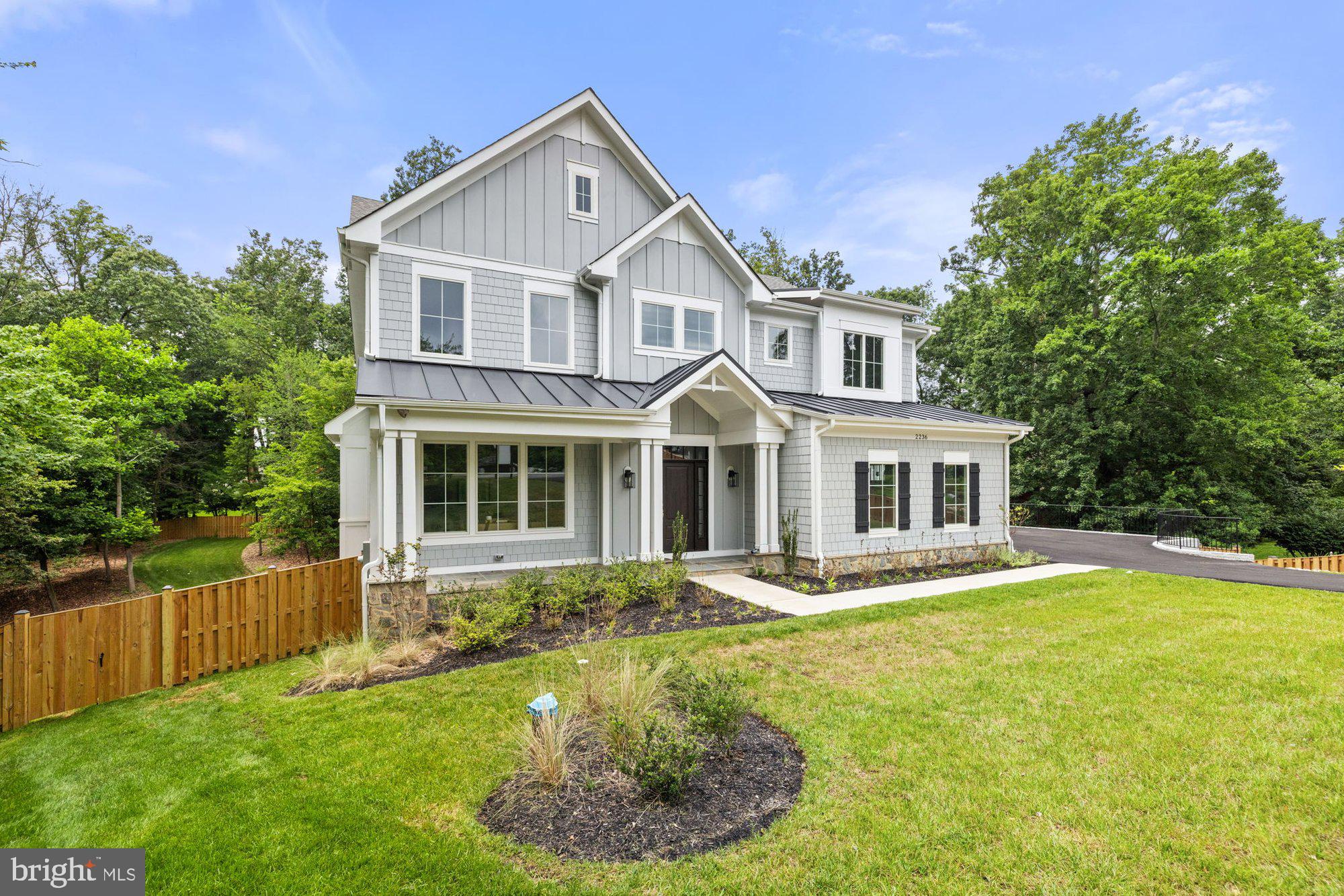 2236 Laurel Ridge Road Vienna, VA 22181 - Photo 70 of 78 a front view of a house with a yard