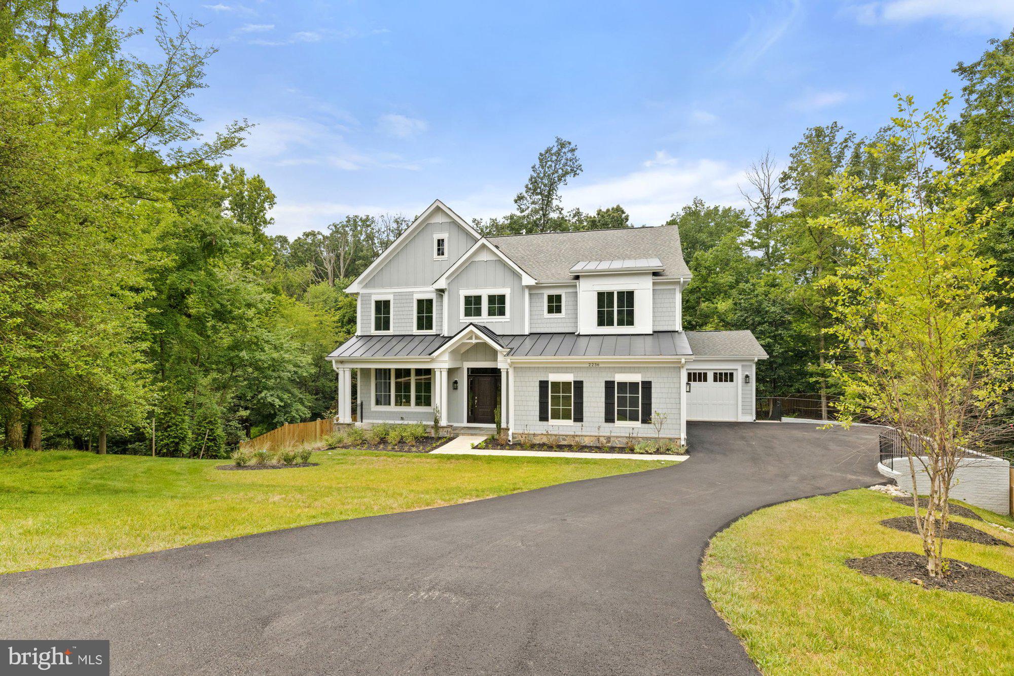 2236 Laurel Ridge Road Vienna, VA 22181 - Photo 71 of 78 a front view of a house with swimming pool and porch