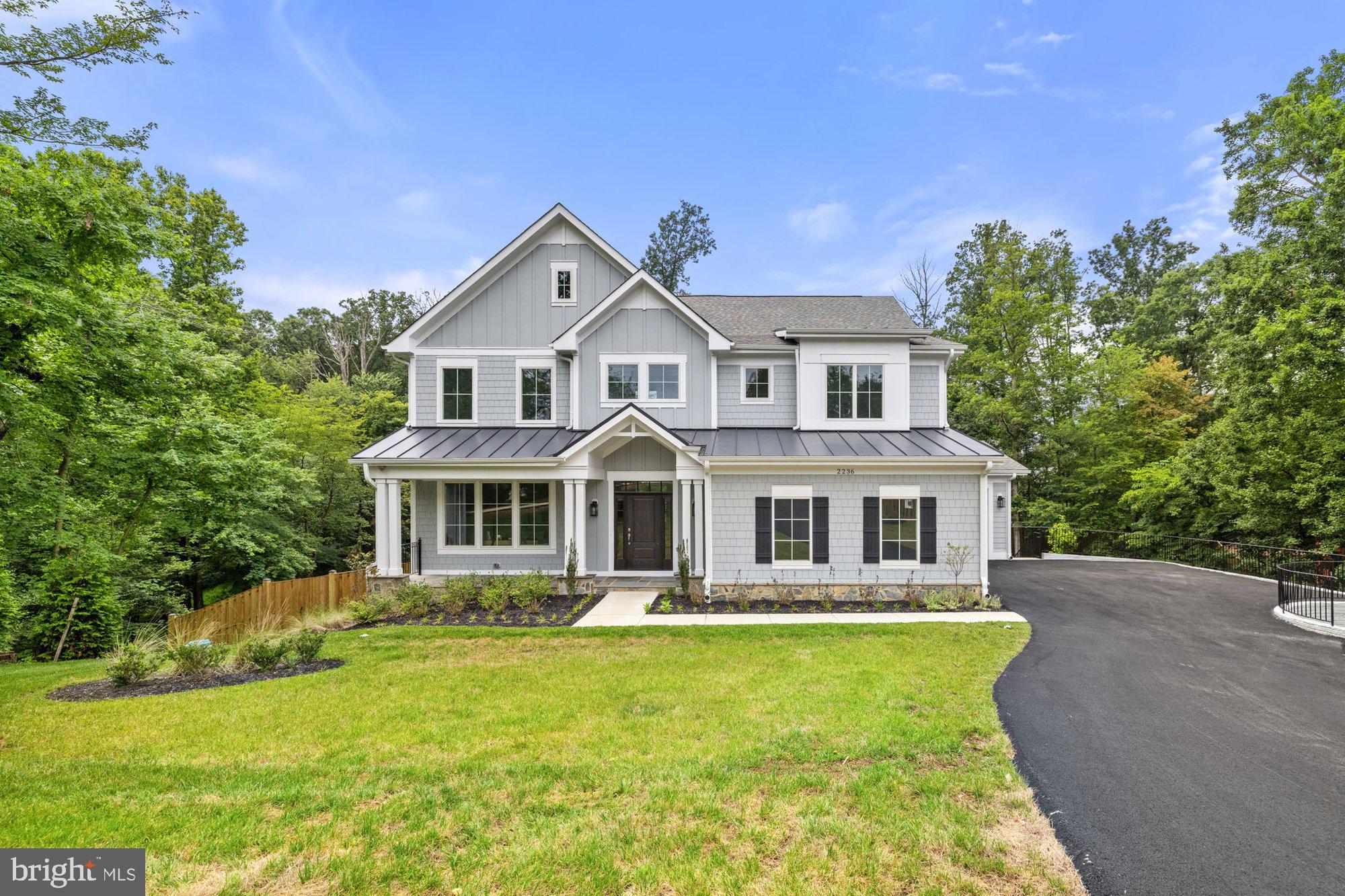 2236 Laurel Ridge Road Vienna, VA 22181 - Photo 73 of 78 a front view of a house with swimming pool and porch