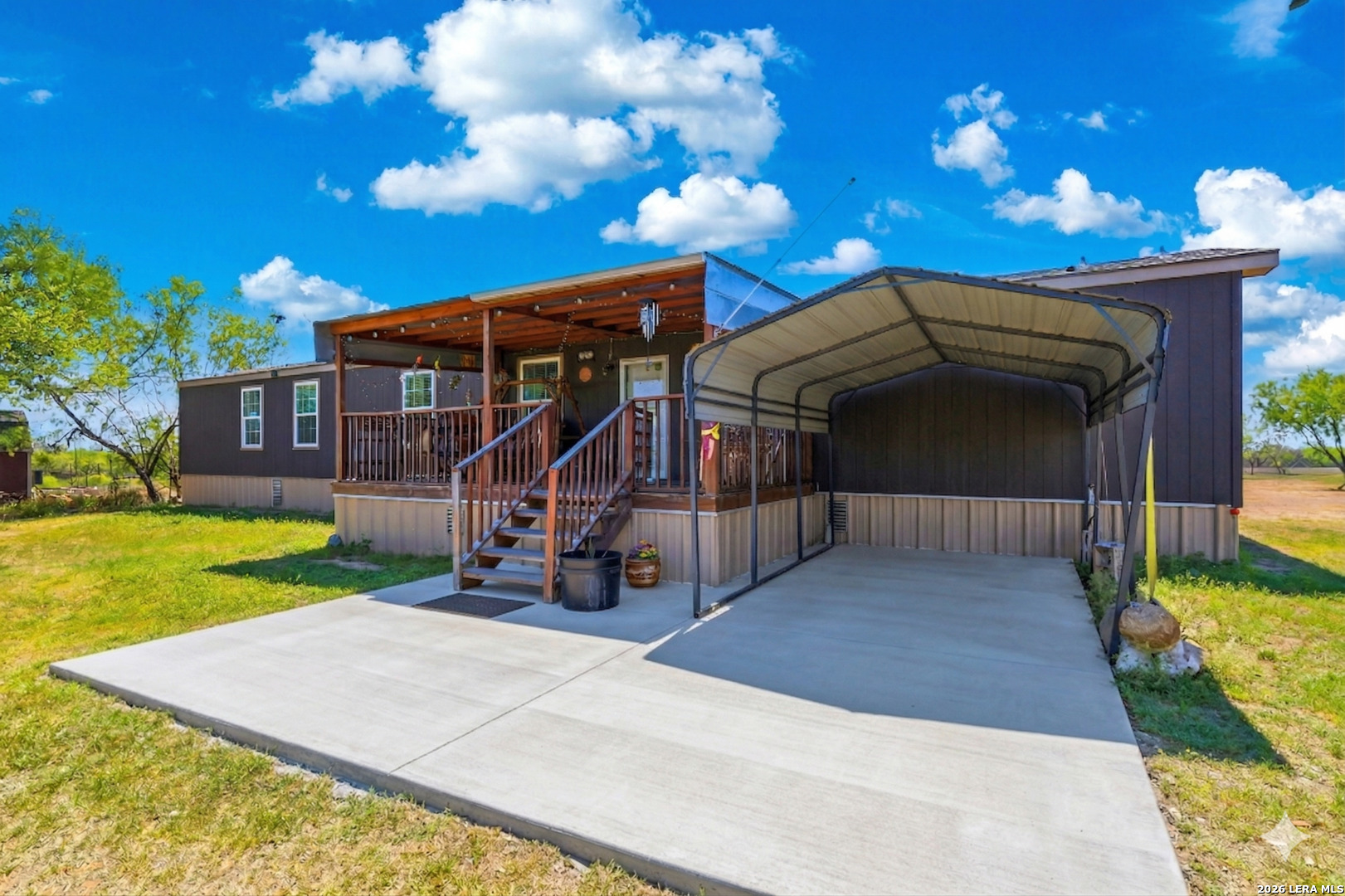 2145 Fm 2504 Poteet, TX 78065 - Photo 1 of 34 a view of a house with a yard