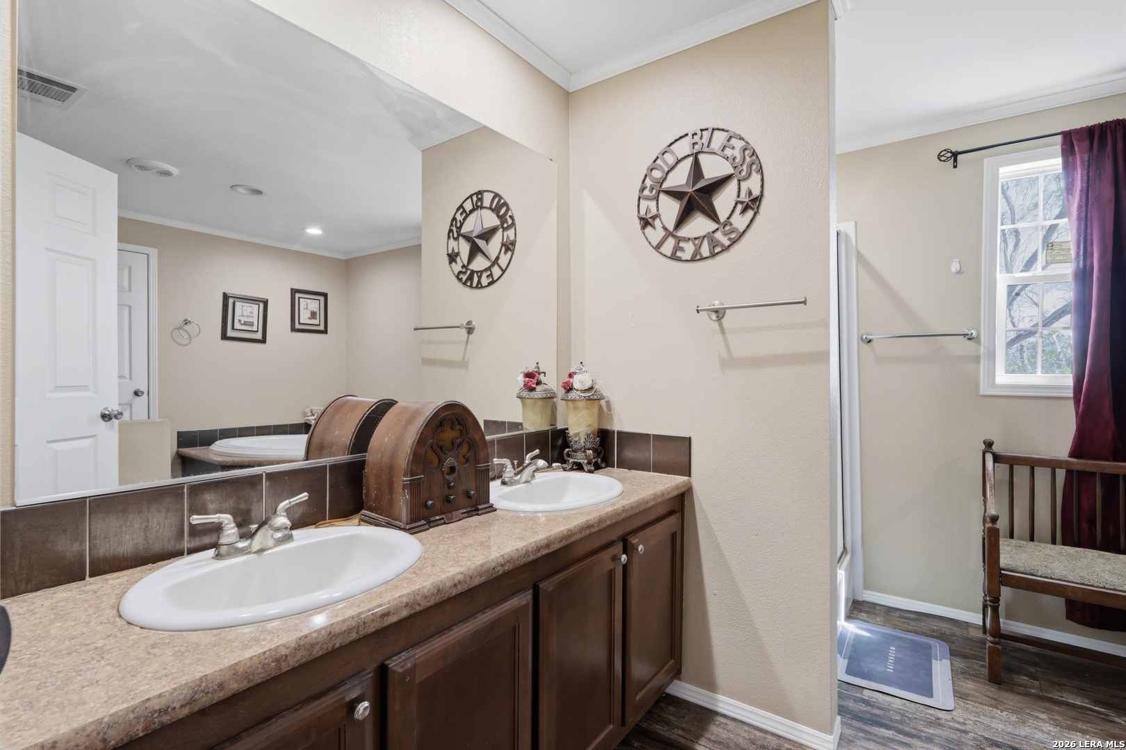 2145 Fm 2504 Poteet, TX 78065 - Photo 11 of 34 a bathroom with a sink and a mirror