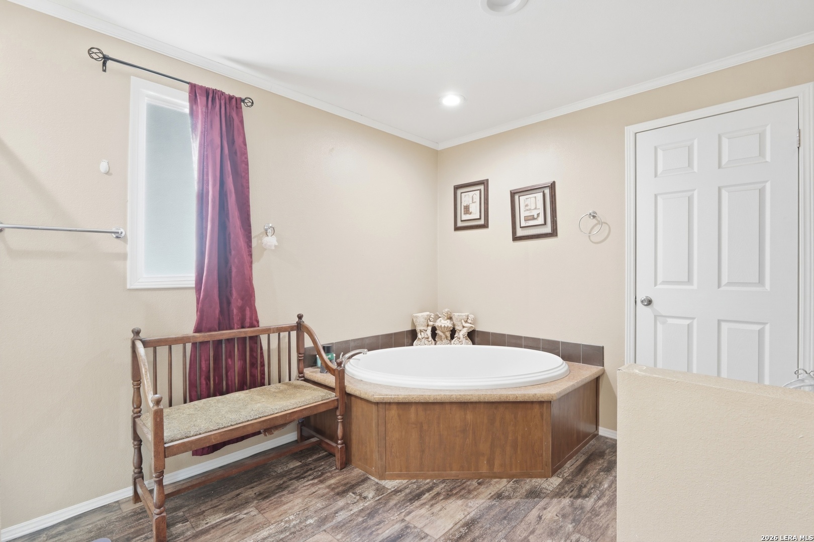 2145 Fm 2504 Poteet, TX 78065 - Photo 12 of 34 a spacious bathroom with a bathtub and a sink