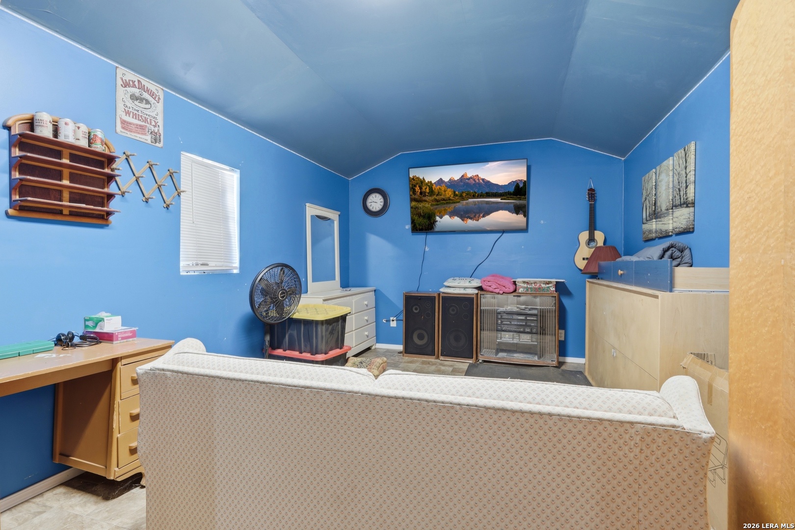 2145 Fm 2504 Poteet, TX 78065 - Photo 22 of 34 a living room with furniture and a flat screen tv