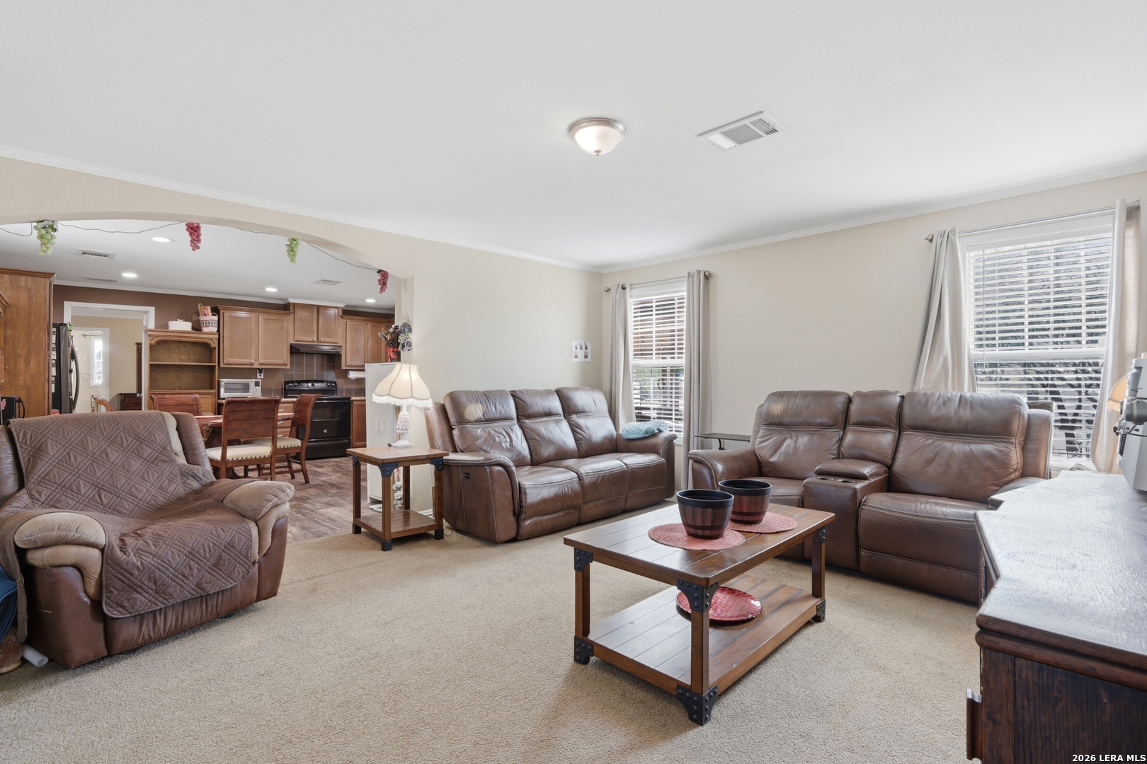 2145 Fm 2504 Poteet, TX 78065 - Photo 3 of 34 a living room with furniture and view of kitchen