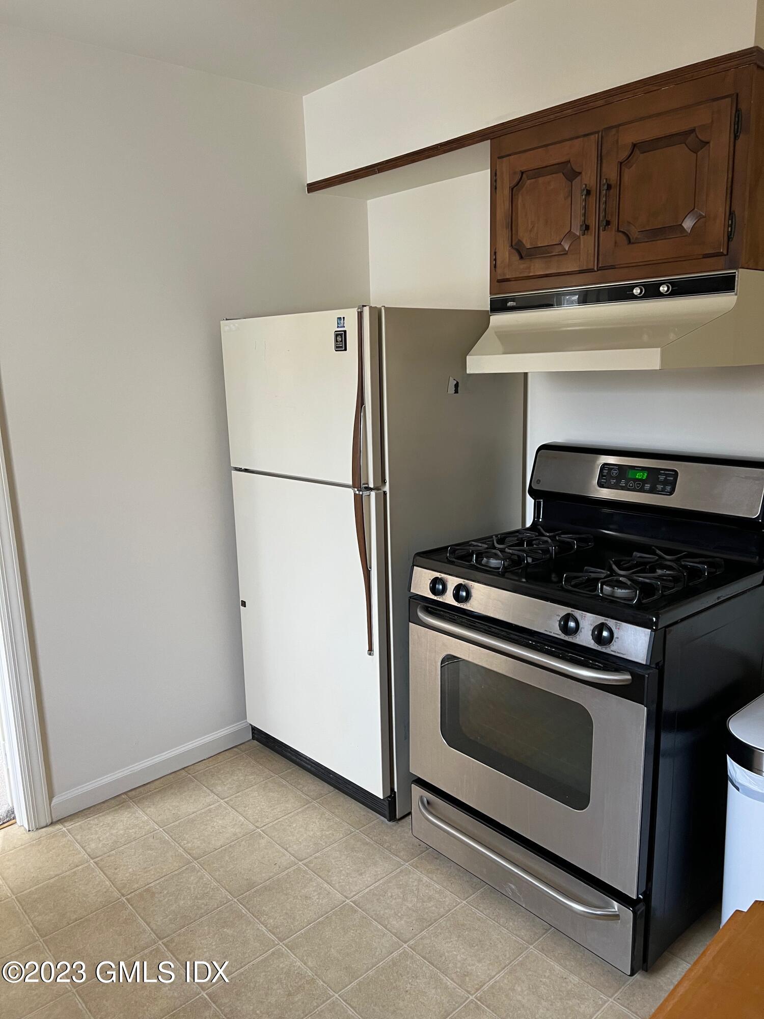 81 View Street West Greenwich, CT 06830 - Photo 3 of 12 a stove top oven sitting inside of a kitchen
