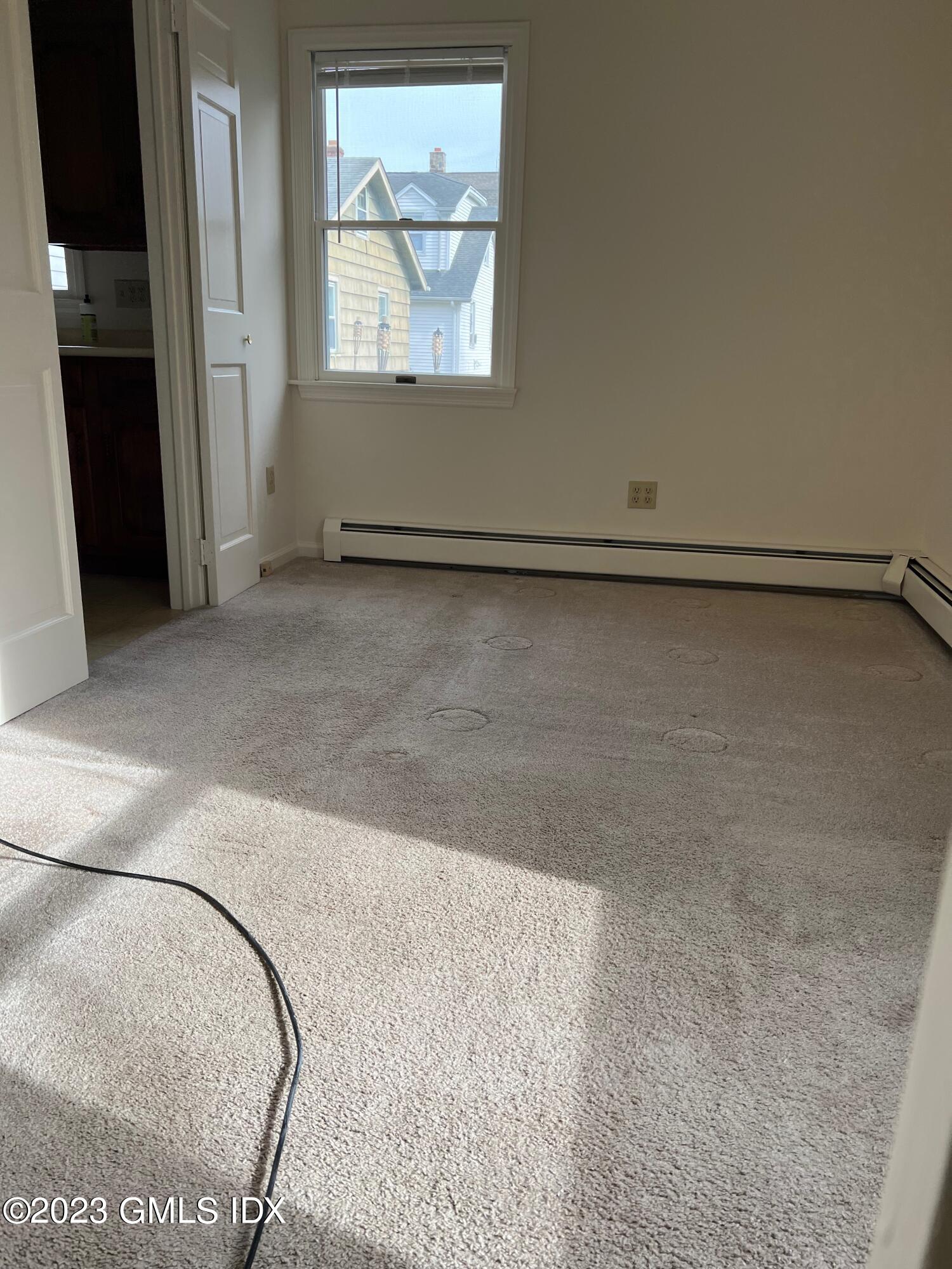 81 View Street West Greenwich, CT 06830 - Photo 4 of 12 an empty room with windows