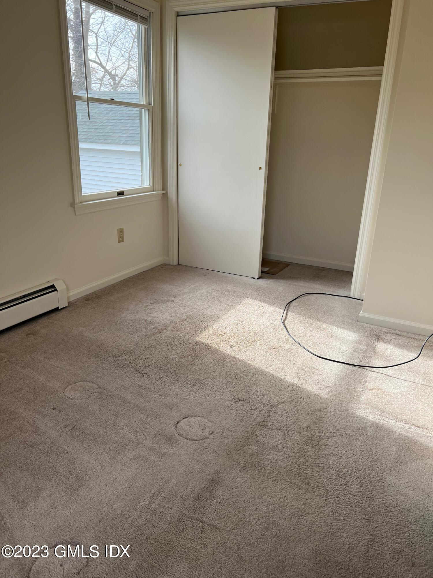 81 View Street West Greenwich, CT 06830 - Photo 5 of 12 a view of wooden floor and cabinet in a room