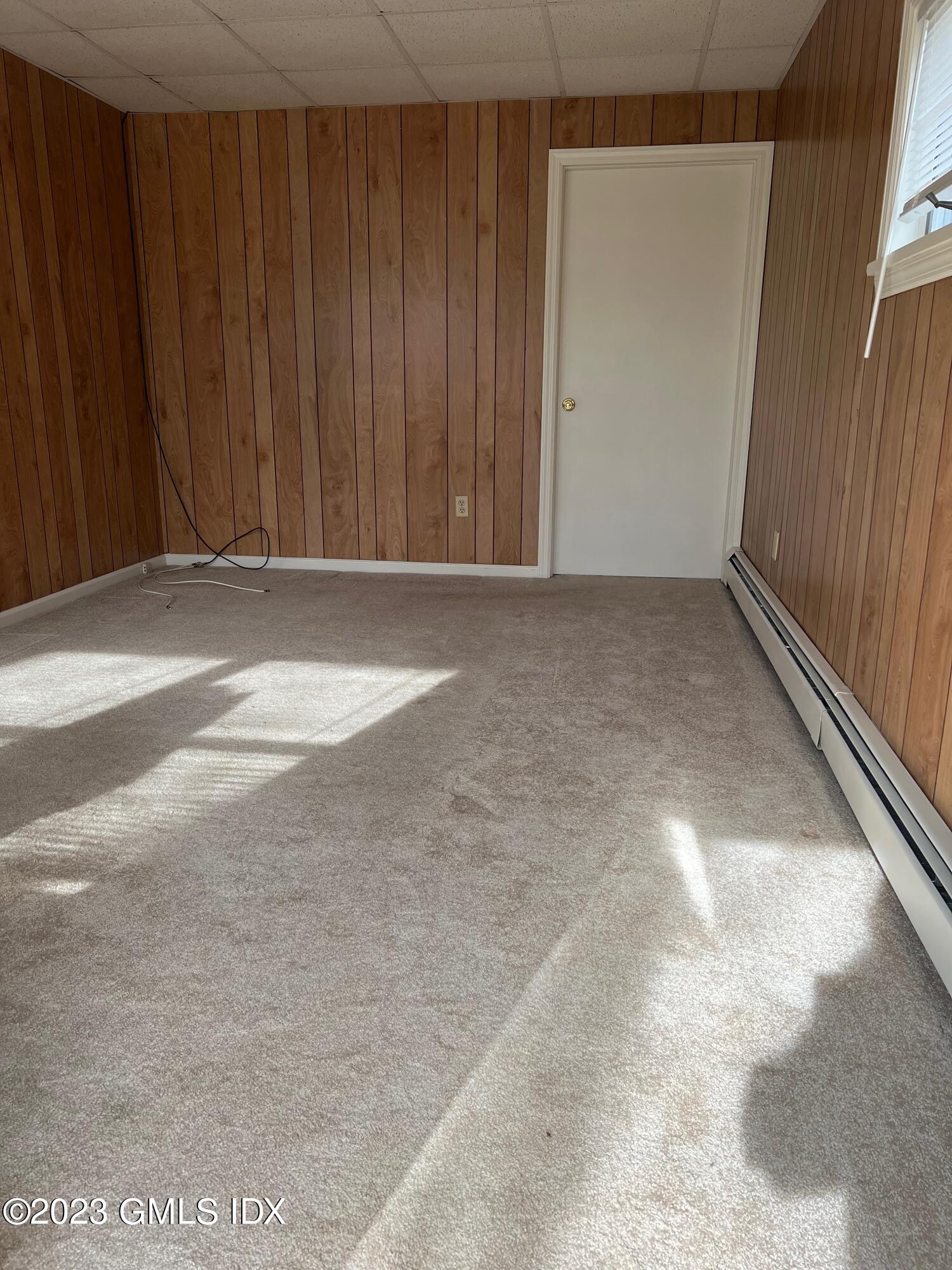 81 View Street West Greenwich, CT 06830 - Photo 8 of 12 a view of a room with wooden walls