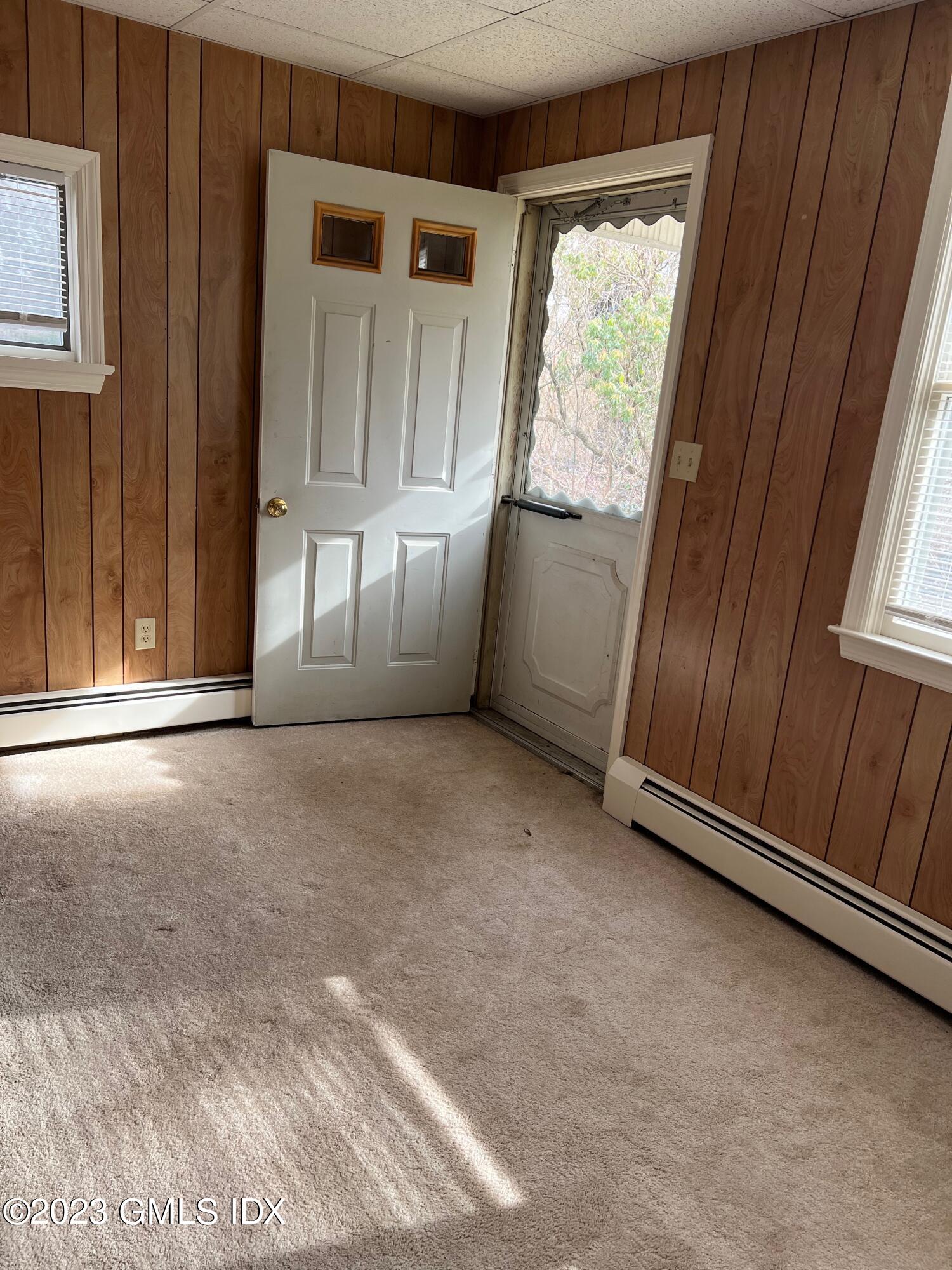 81 View Street West Greenwich, CT 06830 - Photo 9 of 12 an empty room with windows