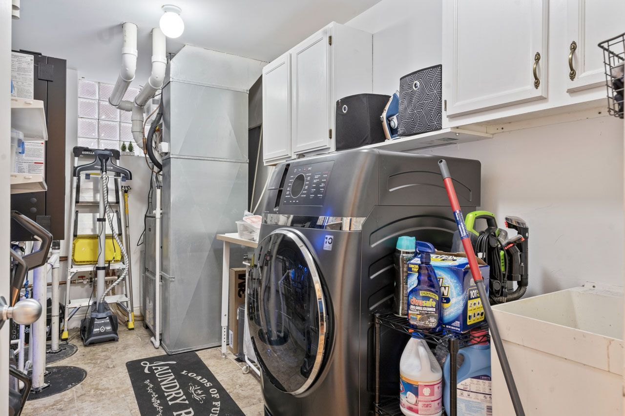 3106 South Wells Street, Unit 1 Chicago, IL 60616 - Photo 32 of 36 a utility room with dryer and washer