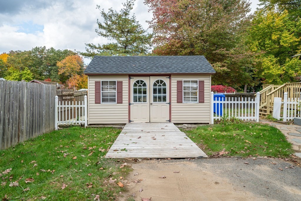 18 Mark Street Springfield, MA 01129 - Photo 3 of 32 a front view of a house with garden
