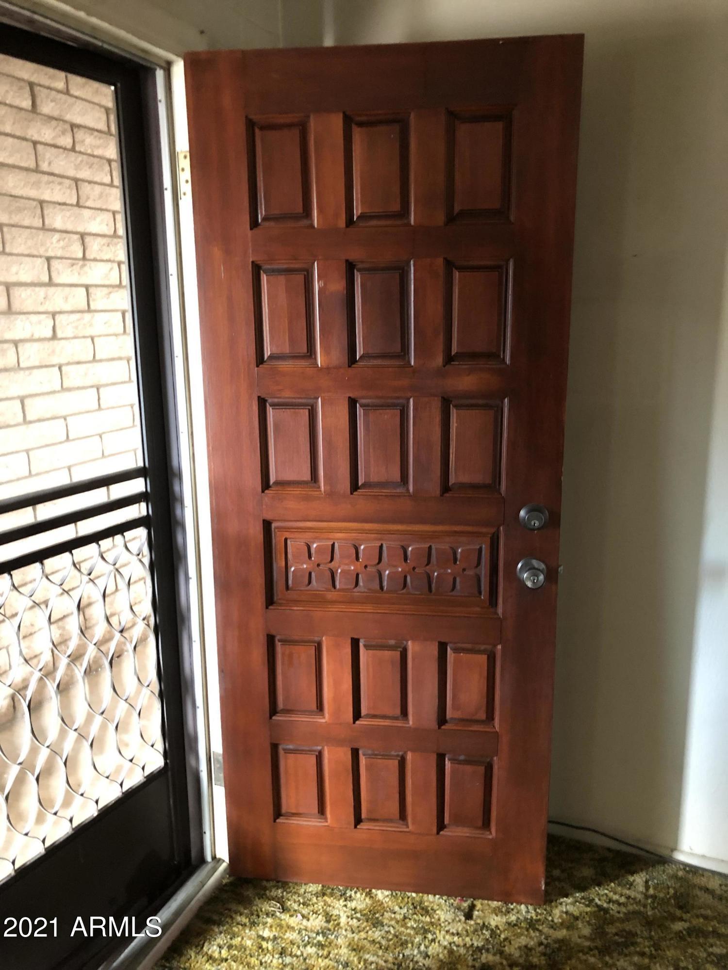 1225 West Mountain View Road Phoenix, AZ 85021 - Photo 4 of 10 SOLID FRONT DOOR