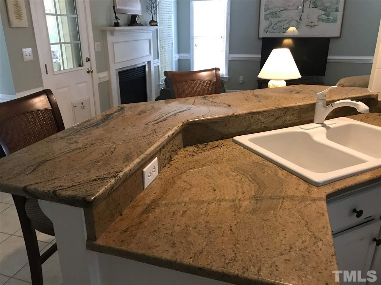 2900 Dahlgreen Road Raleigh, NC 27615 - Photo 21 of 25 Upclose look at the kitchen granite.