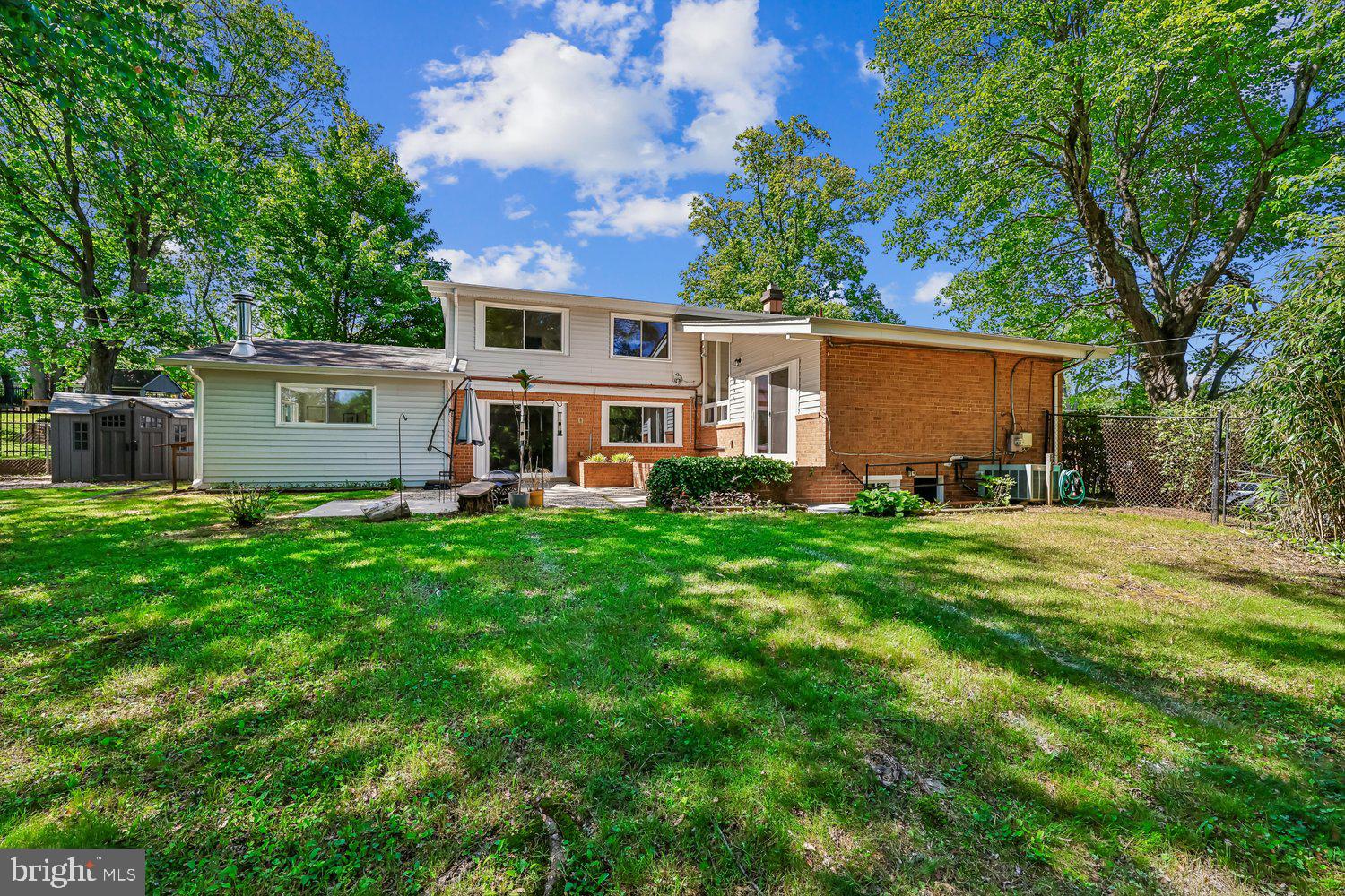 300 Gilsan Court Silver Spring, MD 20902 - Photo 18 of 117 a front view of house with yard and green space