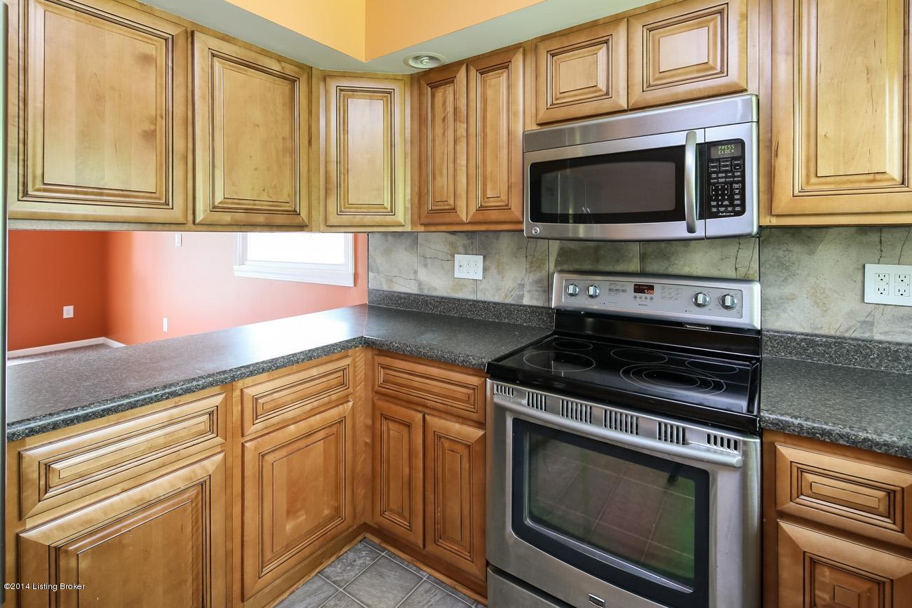 2930 Rio Rita Avenue Louisville, KY 40220 - Photo 7 of 27 These are custom made cabinetry, with a tile back splash