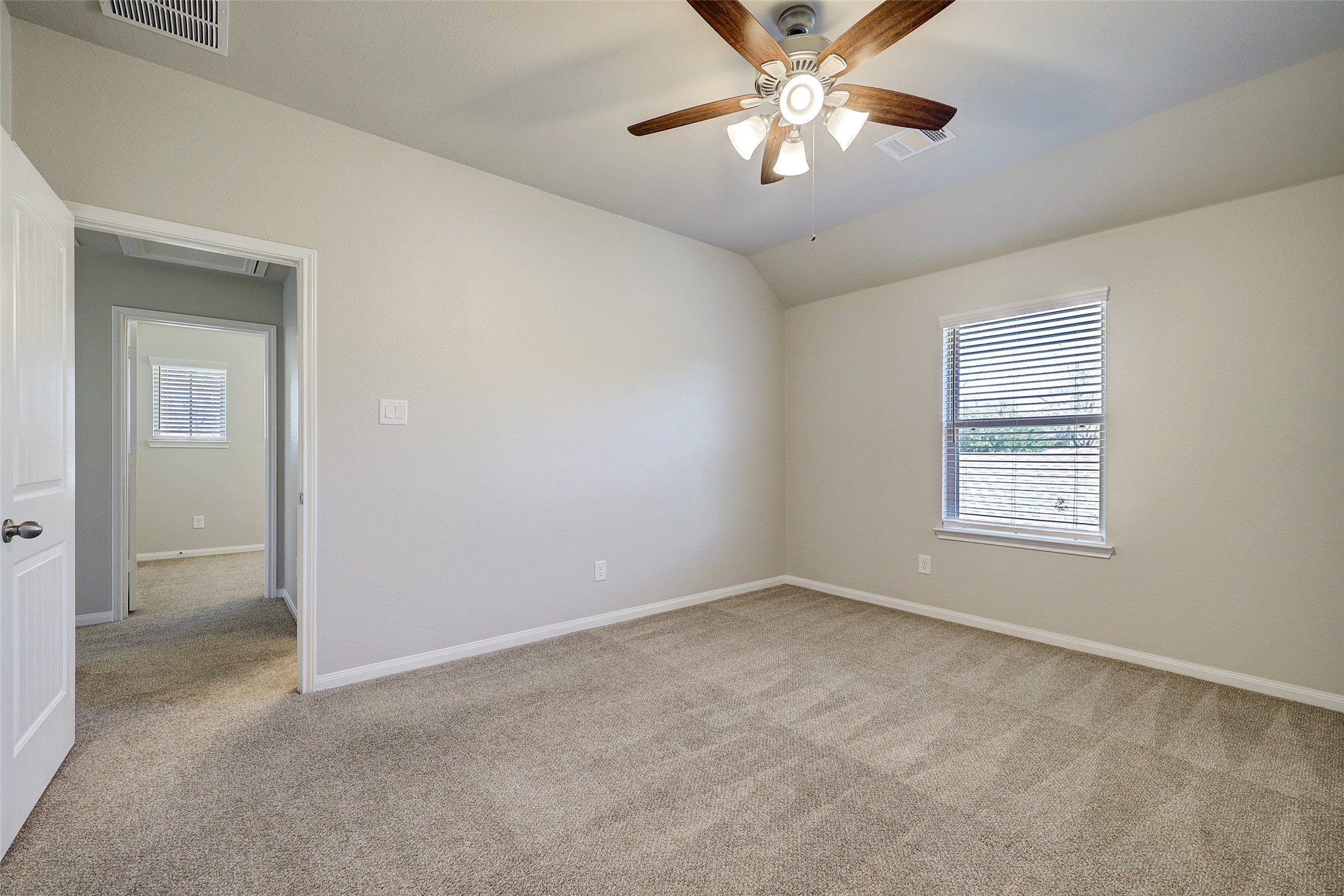 314 Moonwalk Street Montgomery, TX 77356 - Photo 16 of 21 a view of an empty room with a window