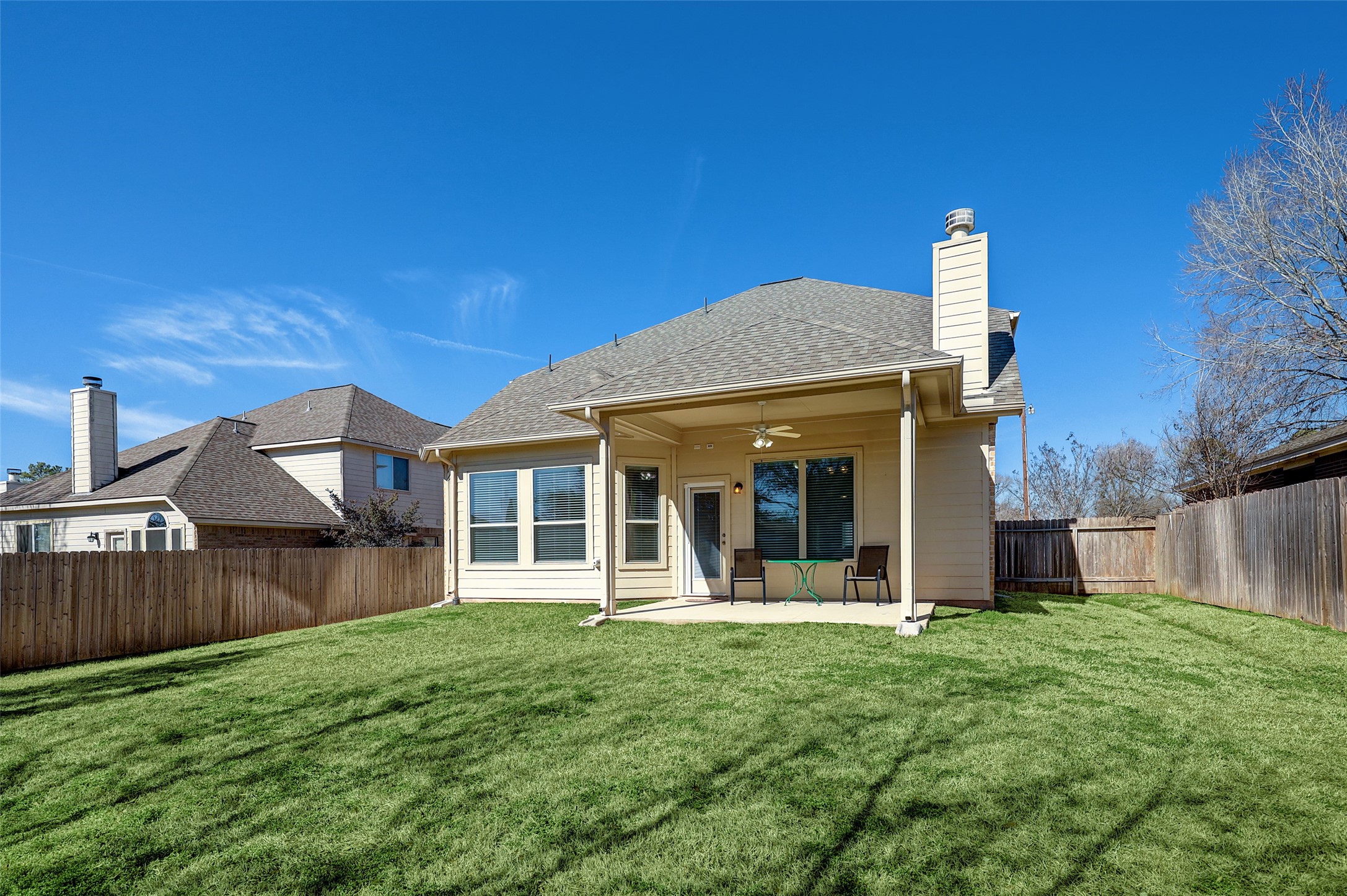 314 Moonwalk Street Montgomery, TX 77356 - Photo 21 of 21 a view of a house with backyard and porch