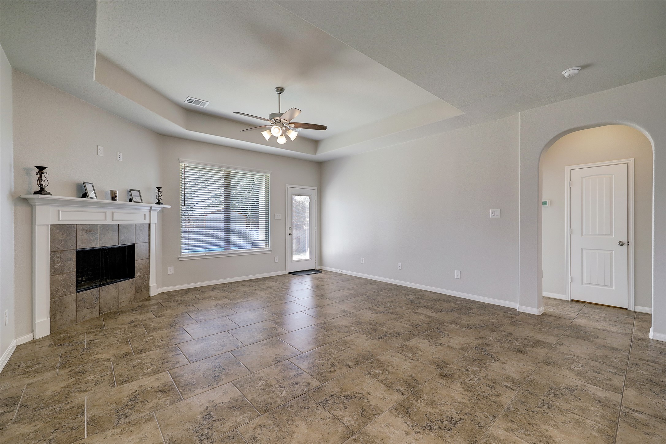 314 Moonwalk Street Montgomery, TX 77356 - Photo 8 of 21 a view of an empty room with a fireplace