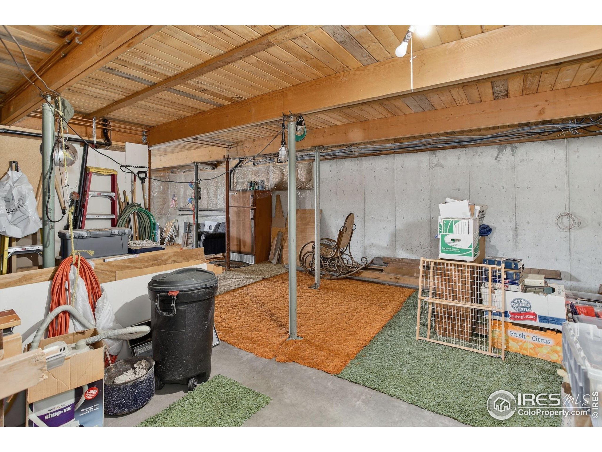 211 Hi Meadow Drive Bailey, CO 80421 - Photo 16 of 19 a view of a chairs and table in the patio