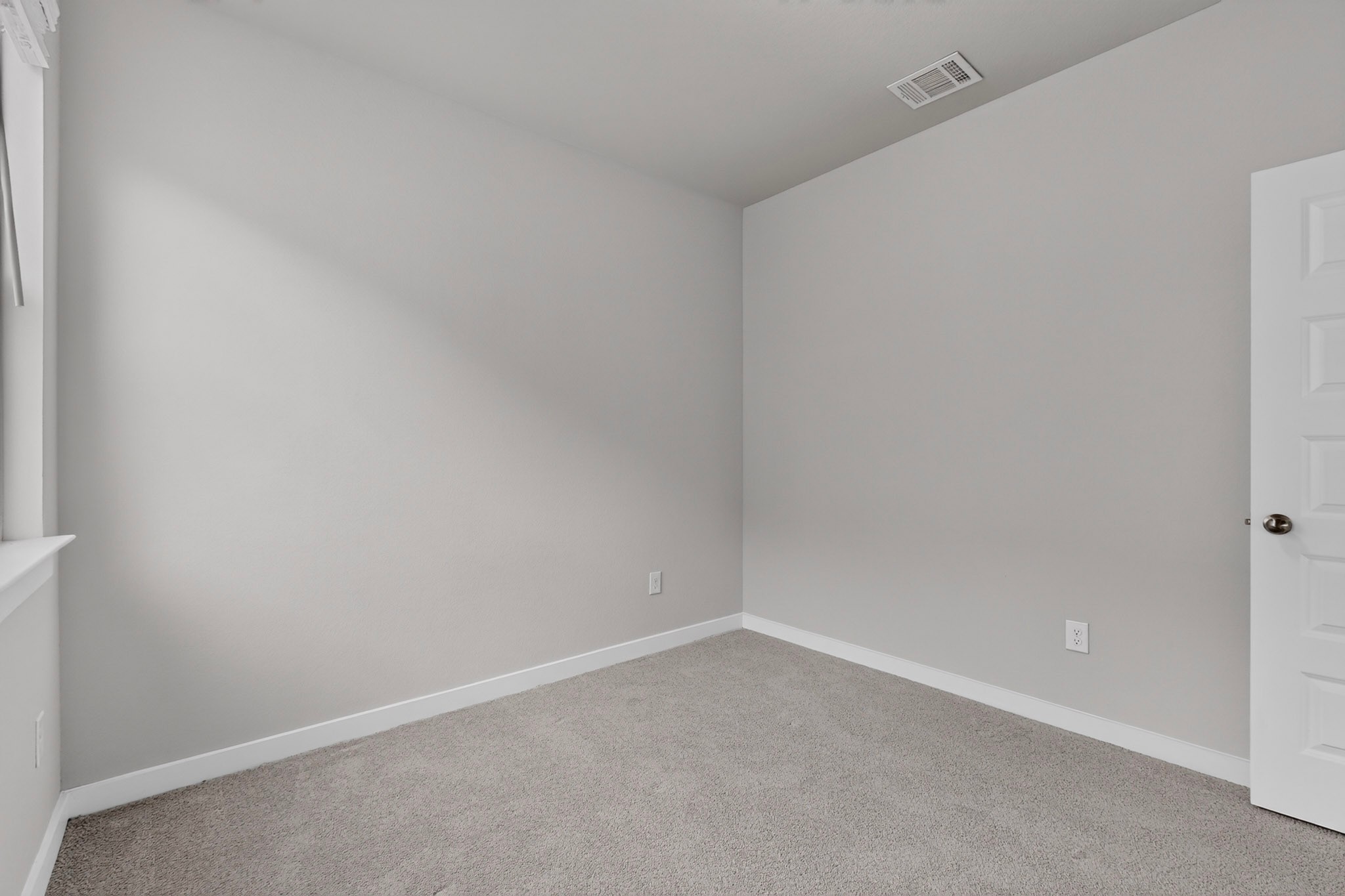 116 Appleberry Lane Elgin, TX 78621 - Photo 20 of 35 A well-lit bedroom offering a blank canvas for personalization and comfort.