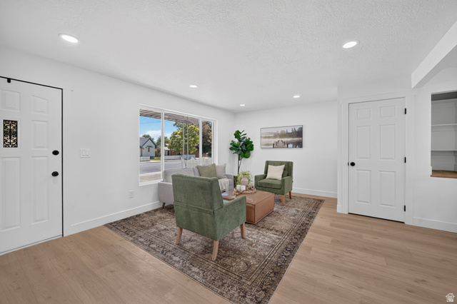 546 West 200 South Payson, UT 84651 - Photo 10 of 45 Bright living area with wide plank wood-finish flooring